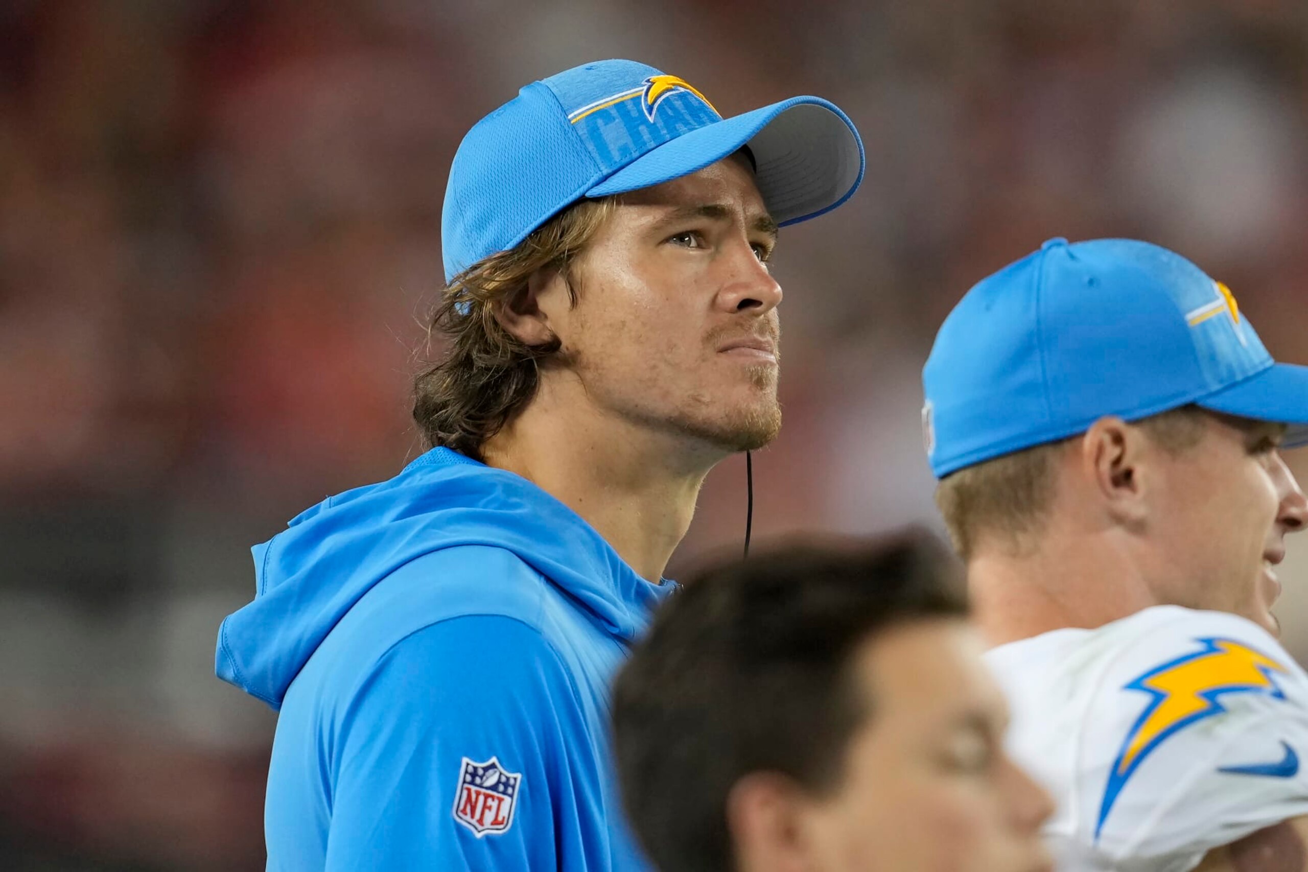 Los Angeles Chargers quarterback Justin Herbert watches during an NFL preseason football game between the San Francisco 49ers and the Chargers in Santa Clara, Calif., Friday, Aug. 25, 2023. (AP Photo/Jeff Chiu)