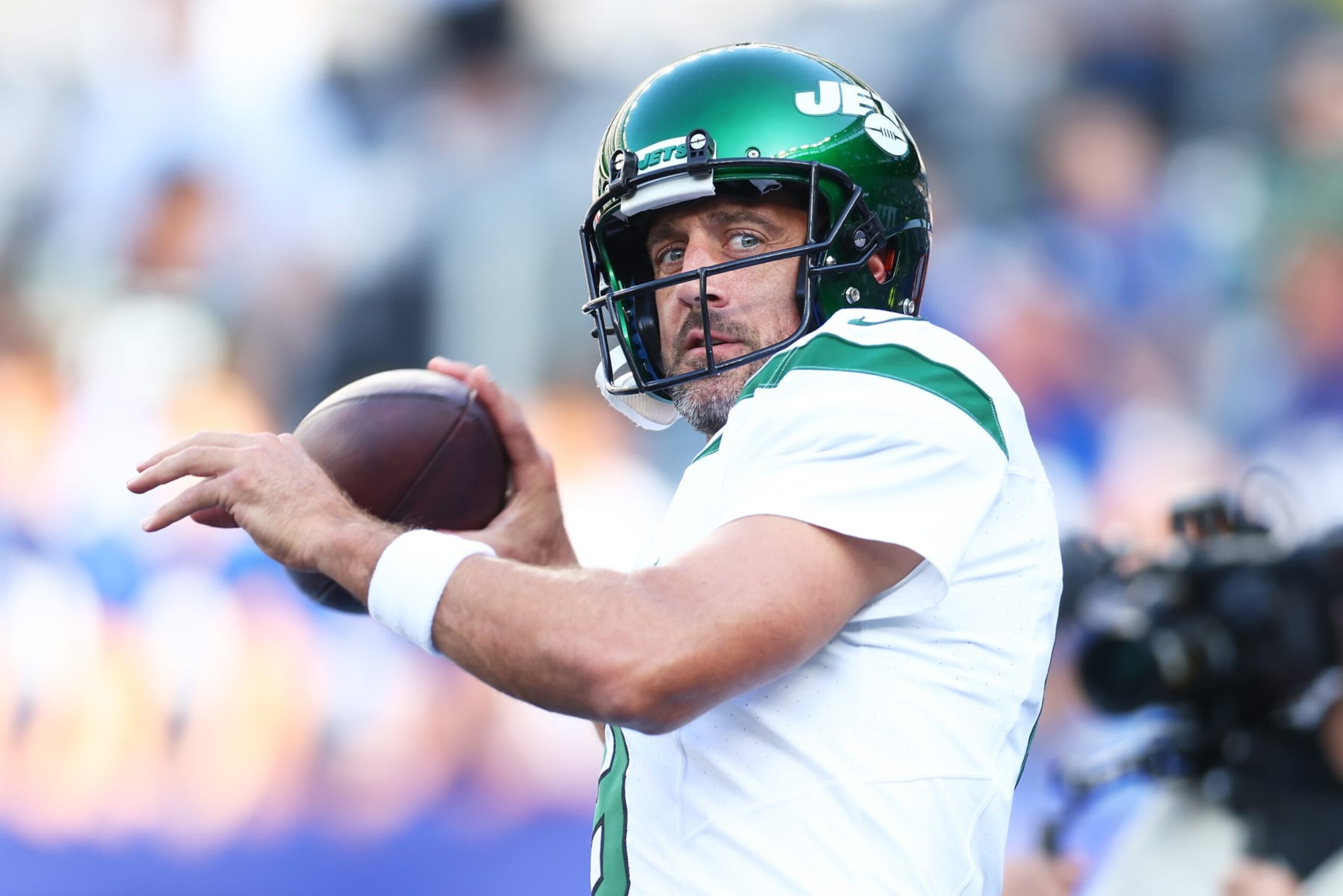 EAST RUTHERFORD, NEW JERSEY - AUGUST 26: Aaron Rodgers #8 of the New York Jets warms up prior to the game against the New York Giants at MetLife Stadium on August 26, 2023 in East Rutherford, New Jersey. (Photo by Mike Stobe/Getty Images)