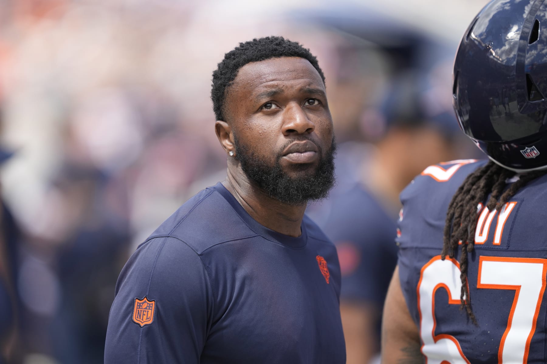 Chicago Bears defensive end Yannick Ngakoue looks at the scoreboard in an NFL preseason football game against the Tennessee Titans Saturday, August 12, 2023, in Chicago. (AP Photo/Charles Rex Arbogast)