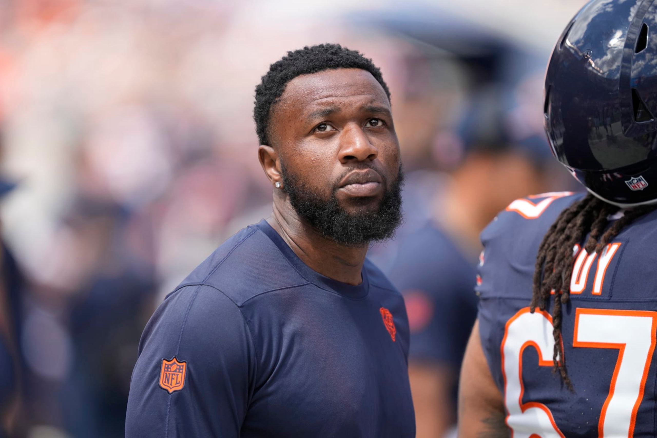 Chicago Bears defensive end Yannick Ngakoue looks at the scoreboard in an NFL preseason football game against the Tennessee Titans Saturday, August 12, 2023, in Chicago. (AP Photo/Charles Rex Arbogast)