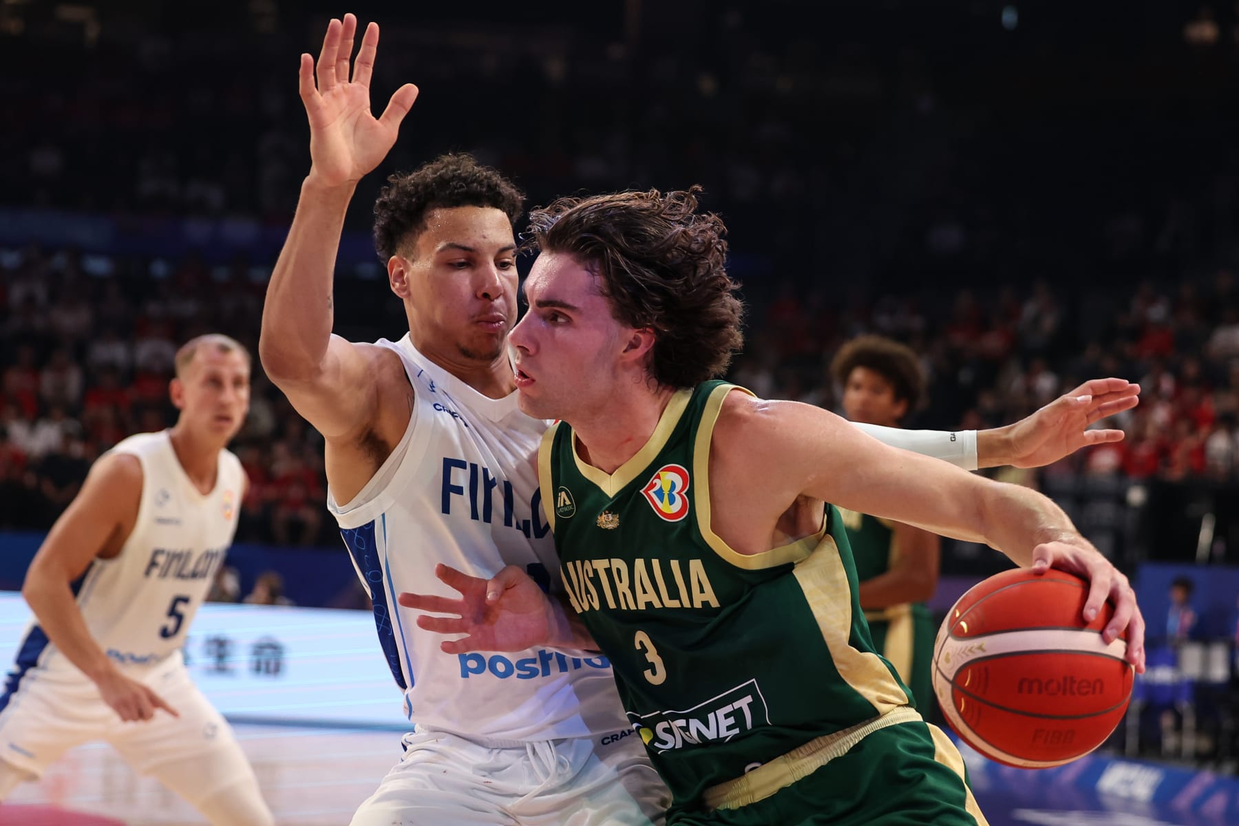OKINAWA, JAPAN - AUGUST 25: Josh Giddey #3 of Australia drives to the basket against Miro Little #1 of Finland during the FIBA World Cup Group E game between Finland and Australia at Okinawa Arena on August 25, 2023 in Okinawa, Japan. (Photo by Takashi Aoyama/Getty Images)