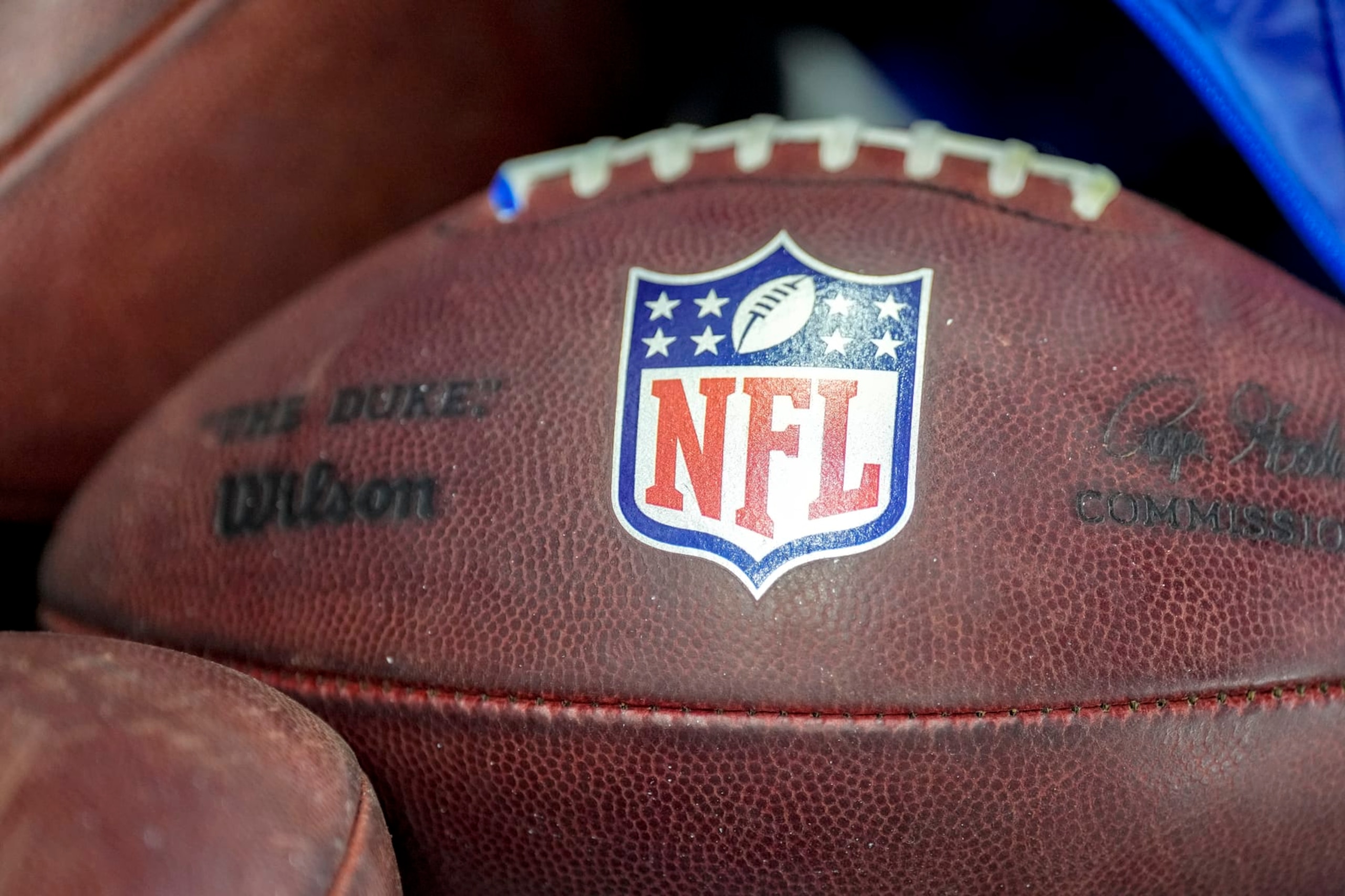 DETROIT, MICHIGAN - AUGUST 19: The NFL logo is pictured on a Wilson brand football during the preseason game between the Detroit Lions and Jacksonville Jaguars at Ford Field on August 19, 2023 in Detroit, Michigan. (Photo by Nic Antaya/Getty Images)