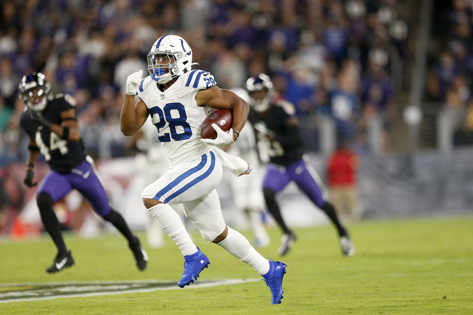 BALTIMORE, MD - OCTOBER 11: Indianapolis Colts Running Back Jonathan Taylor (28) breaks away and takes in 76 yards for the touchdown during and NFL game between the Indianapolis Colts and Baltimore Ravens on October 11, 2021at M&T Stadium in Baltimore Maryland.(Photo by Jeffrey Brown/Icon Sportswire via Getty Images)