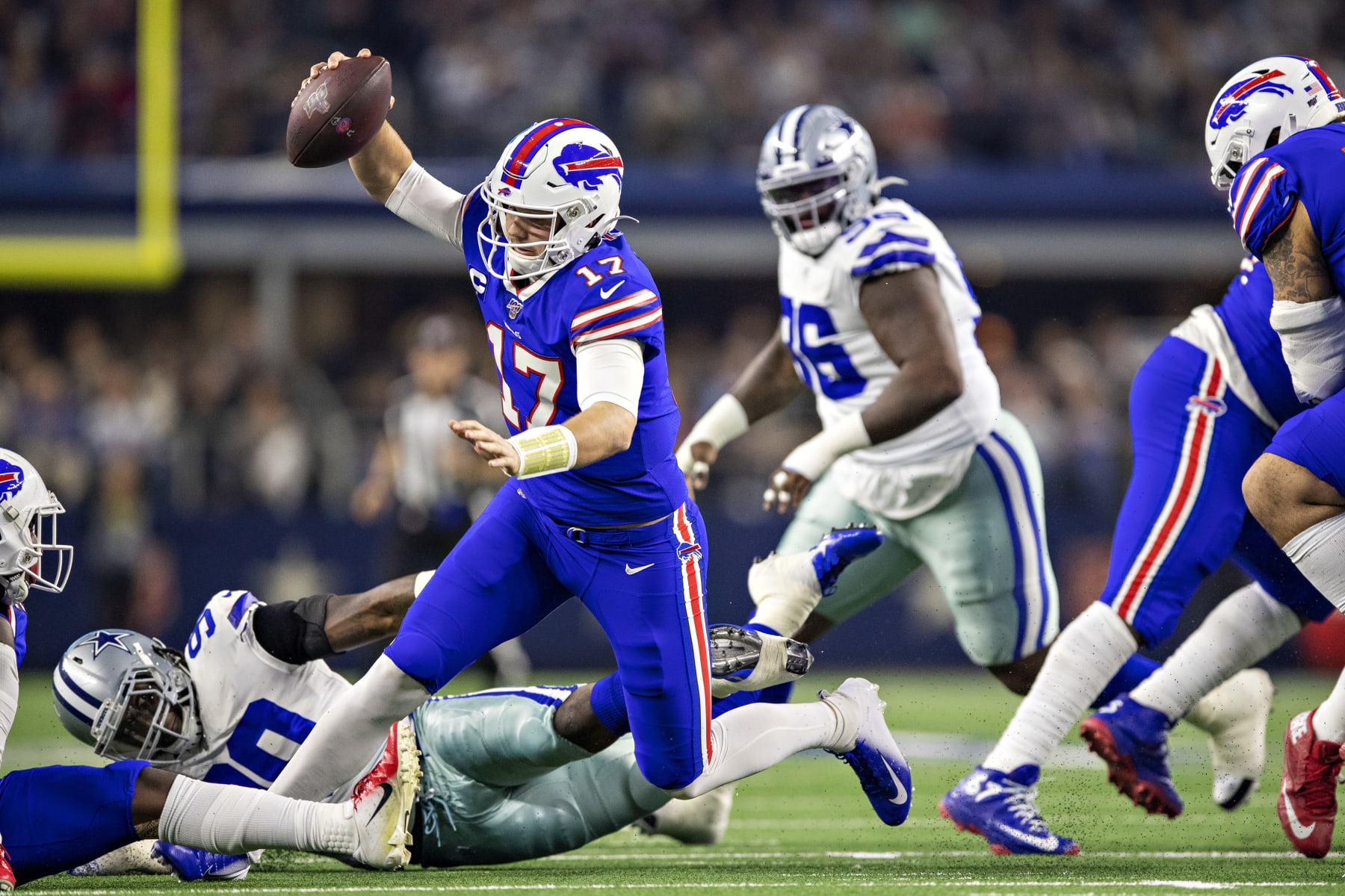 ARLINGTON, TX - NOVEMBER 28: Josh Allen #17 of the Buffalo Bills gets away from the rush during the first half of a game on Thanksgiving Day against the Dallas Cowboys at AT&T Stadium on November 28, 2019 in Arlington, Texas. The Bills defeated the Cowboys 26-15. (Photo by Wesley Hitt/Getty Images) ARLINGTON, TX - NOVEMBER 28: Josh Allen #17 of the Buffalo Bills gets away from the rush during the first half of a game on Thanksgiving Day against the Dallas Cowboys at AT&T Stadium on November 28, 2019 in Arlington, Texas. The Bills defeated the Cowboys 26-15. (Photo by Wesley Hitt/Getty Images)