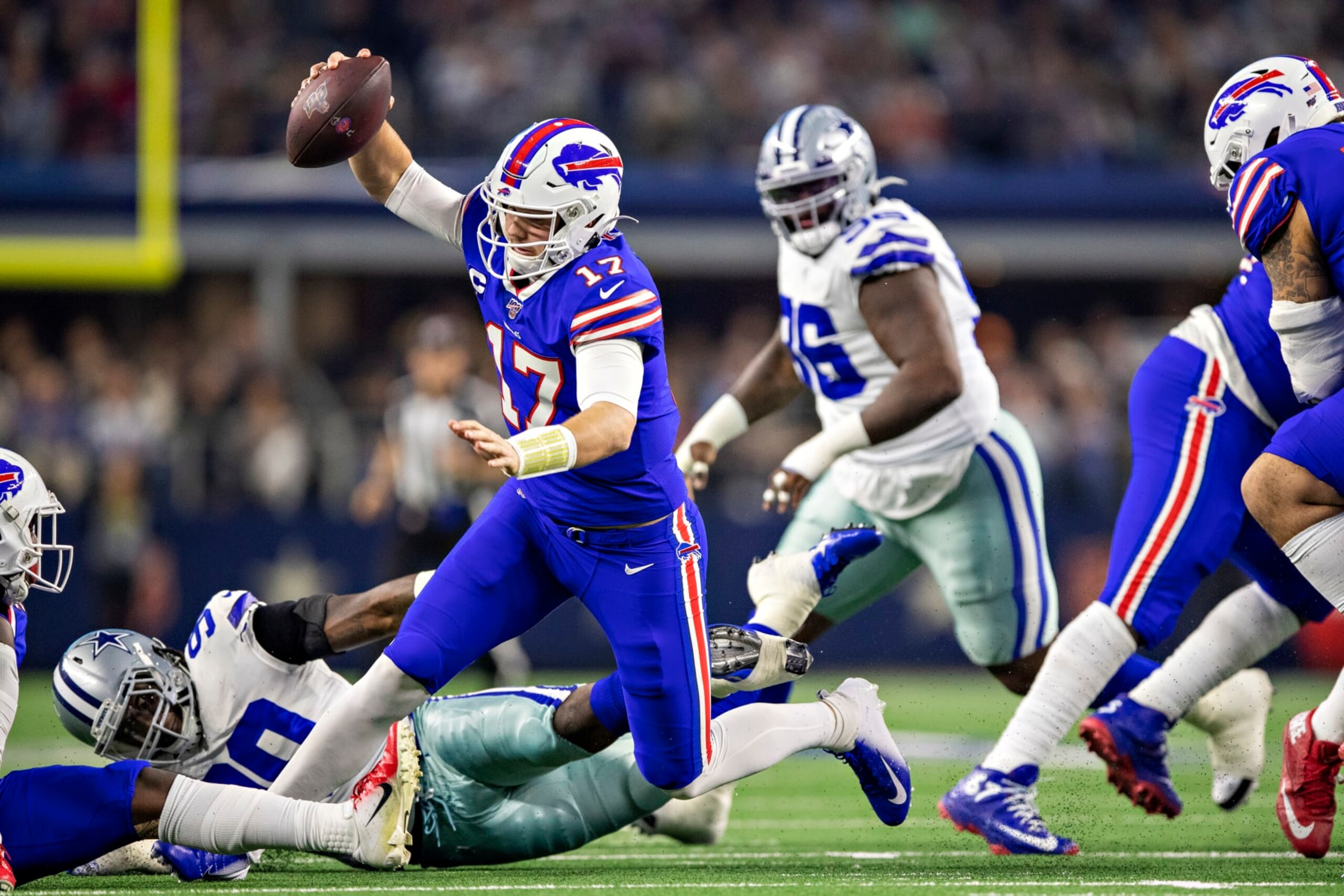 ARLINGTON, TX - NOVEMBER 28: Josh Allen #17 of the Buffalo Bills gets away from the rush during the first half of a game on Thanksgiving Day against the Dallas Cowboys at AT&T Stadium on November 28, 2019 in Arlington, Texas. The Bills defeated the Cowboys 26-15. (Photo by Wesley Hitt/Getty Images) ARLINGTON, TX - NOVEMBER 28: Josh Allen #17 of the Buffalo Bills gets away from the rush during the first half of a game on Thanksgiving Day against the Dallas Cowboys at AT&T Stadium on November 28, 2019 in Arlington, Texas. The Bills defeated the Cowboys 26-15. (Photo by Wesley Hitt/Getty Images)