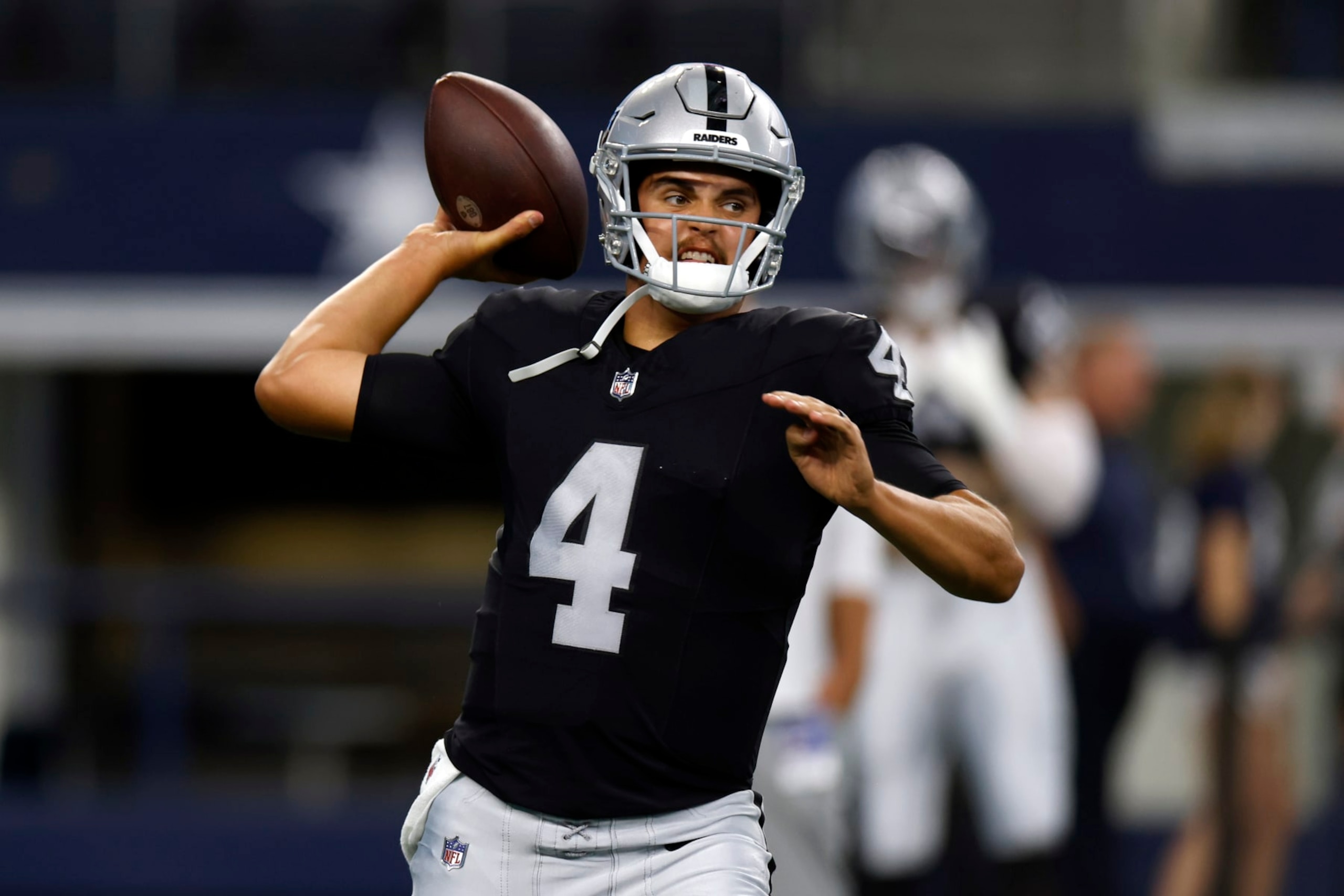 ARLINGTON, TX - AUGUST 26: Aidan O'Connell #4 of the Las Vegas Raiders throws before a preseason game against the Dallas Cowboys at AT&T Stadium on August 26, 2023 in Arlington, Texas. (Photo by Ron Jenkins/Getty Images)