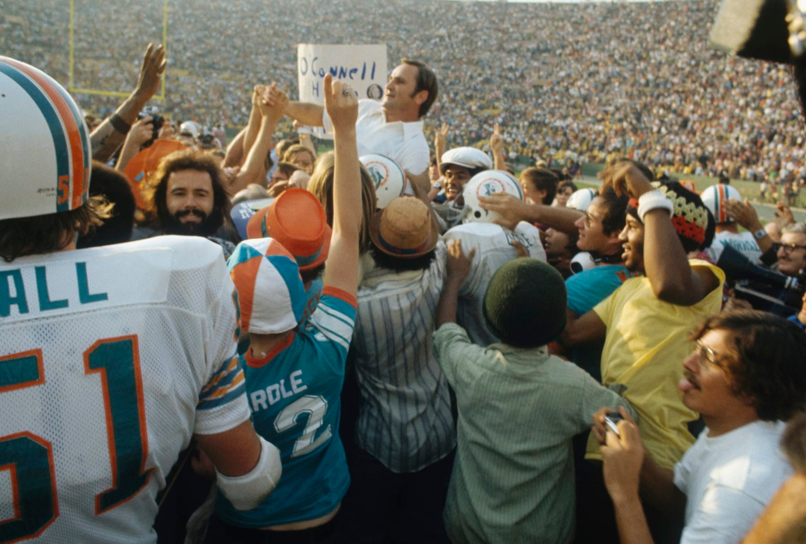 LOS ANGELES - JANUARY 14: Don Shula, coach of the Miami Dolphins, is carried off the field by his team while celebrating victory against the Washington Redskins during the Super Bowl VIII at Memorial Coliseum in Los Angeles, California on January 14, 1973. The Dolphins defeated the Redskins 14-7. (Photo by Focus On Sport/Getty Images)