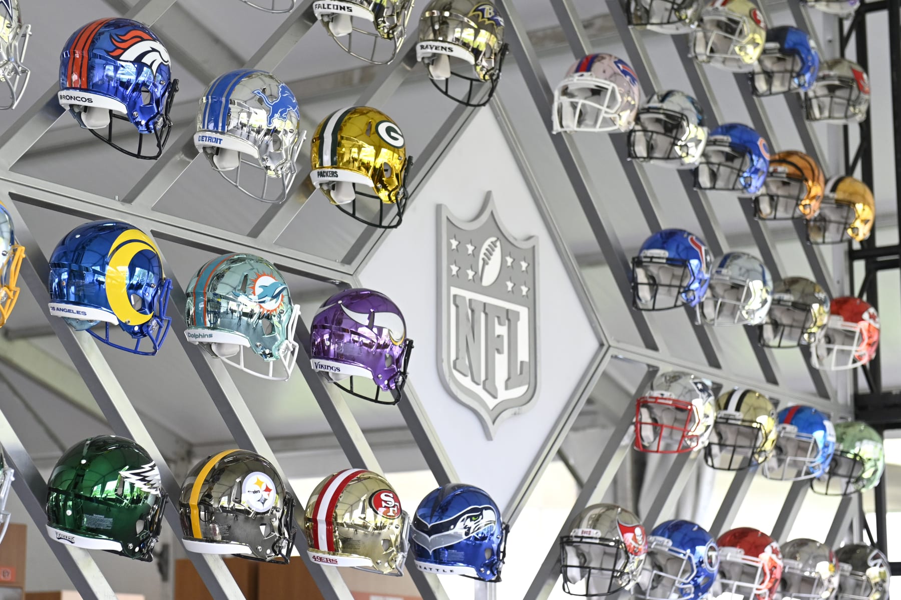 CLEVELAND, OHIO - APRIL 28: Wall of NFL team helmets on display inside the NFL Locker Room at the NFL Draft Experience on April 28, 2021 in Cleveland, Ohio. (Photo by Duane Prokop/Getty Images)