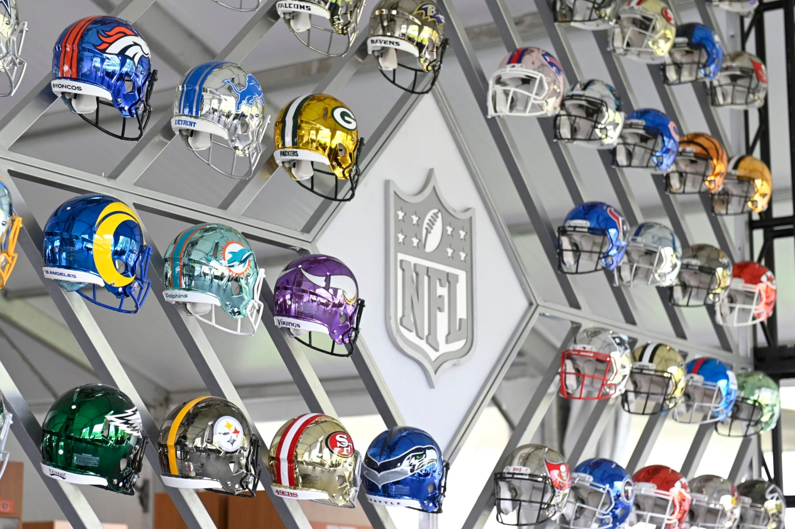 CLEVELAND, OHIO - APRIL 28: Wall of NFL team helmets on display inside the NFL Locker Room at the NFL Draft Experience on April 28, 2021 in Cleveland, Ohio. (Photo by Duane Prokop/Getty Images) CLEVELAND, OHIO - APRIL 28: Wall of NFL team helmets on display inside the NFL Locker Room at the NFL Draft Experience on April 28, 2021 in Cleveland, Ohio. (Photo by Duane Prokop/Getty Images)