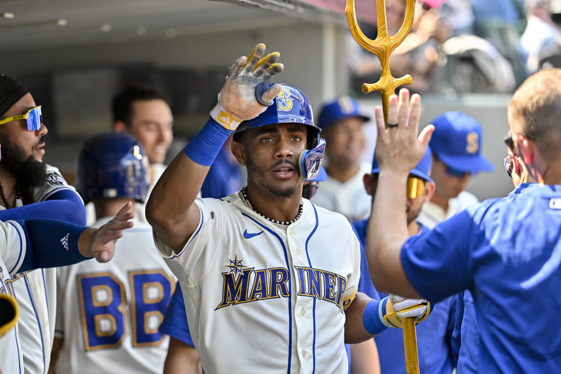 SEATTLE, WASHINGTON - AUGUST 27: Julio Rodriguez #44 of the Seattle Mariners celebrates with teammates after hitting a two-run home run during the fifth inning against the Kansas City Royals at T-Mobile Park on August 27, 2023 in Seattle, Washington. (Photo by Alika Jenner/Getty Images)