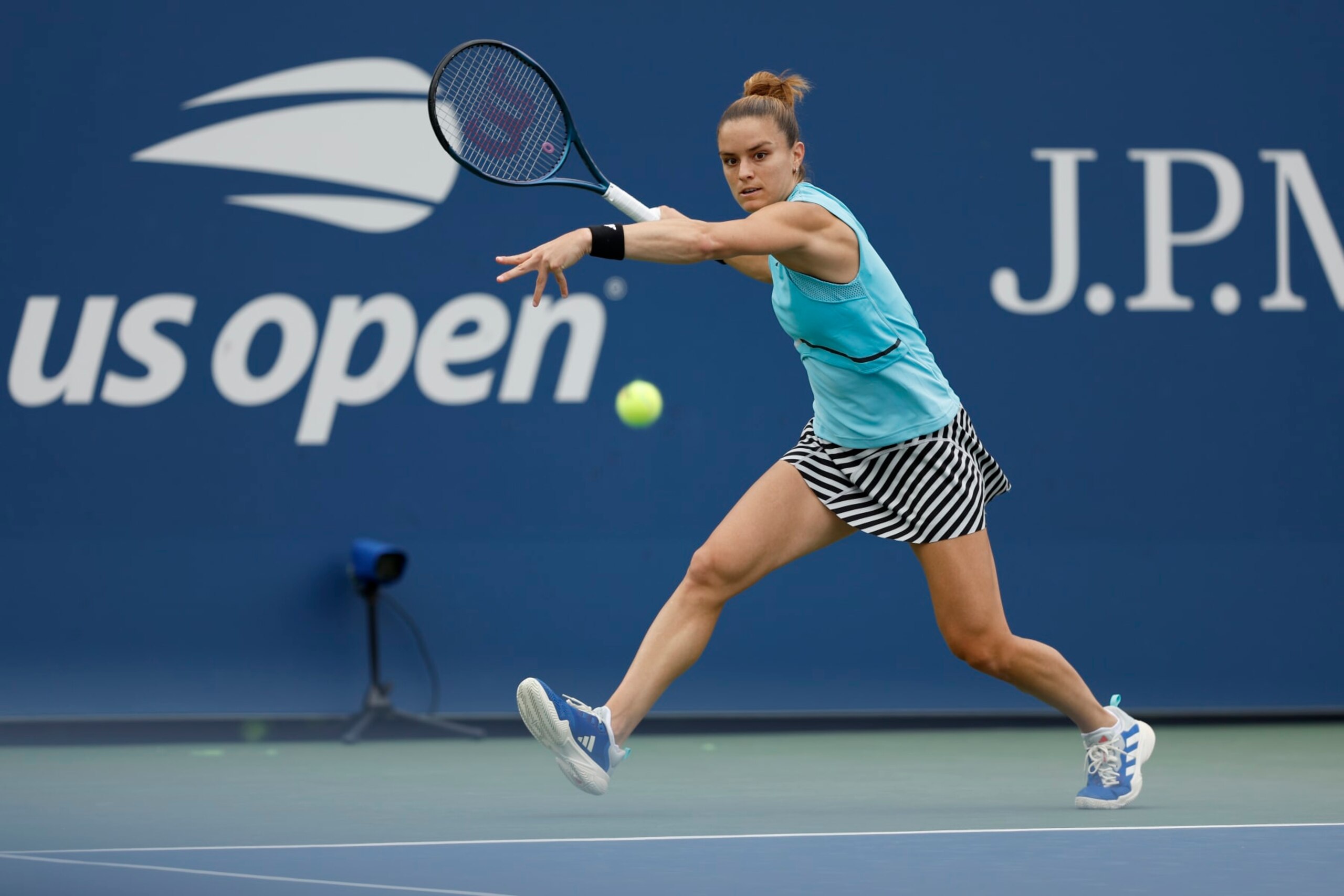 NEW YORK, NEW YORK - AUGUST 28: Maria Sakkari of Greece returns a shot against Rebeka Masarova of Spain during their Women's Singles First Round match on Day One of the 2023 US Open at the USTA Billie Jean King National Tennis Center on August 28, 2023 in the Flushing neighborhood of the Queens borough of New York City. (Photo by Sarah Stier/Getty Images) NEW YORK, NEW YORK - AUGUST 28: Maria Sakkari of Greece returns a shot against Rebeka Masarova of Spain during their Women's Singles First Round match on Day One of the 2023 US Open at the USTA Billie Jean King National Tennis Center on August 28, 2023 in the Flushing neighborhood of the Queens borough of New York City. (Photo by Sarah Stier/Getty Images)