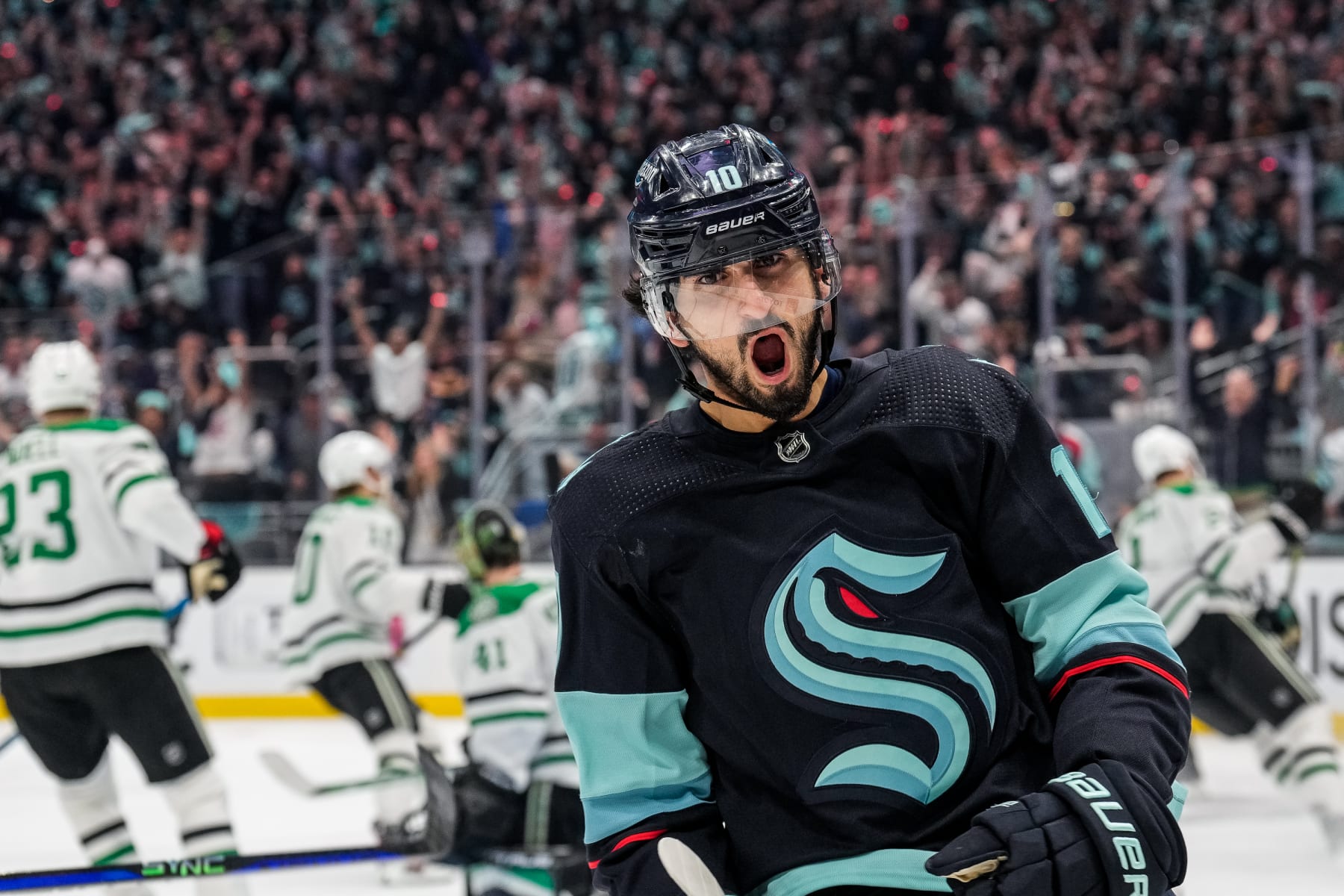 SEATTLE, WASHINGTON - MAY 12:Matty Beniers #10 of the Seattle Kraken celebrates scoring a goal against the Dallas Stars during the third period in Game Six of the Second Round of the 2023 Stanley Cup Playoffs at Climate Pledge Arena on May 12, 2023 in Seattle, Washington. (Photo by Christopher Mast/NHLI via Getty Images)