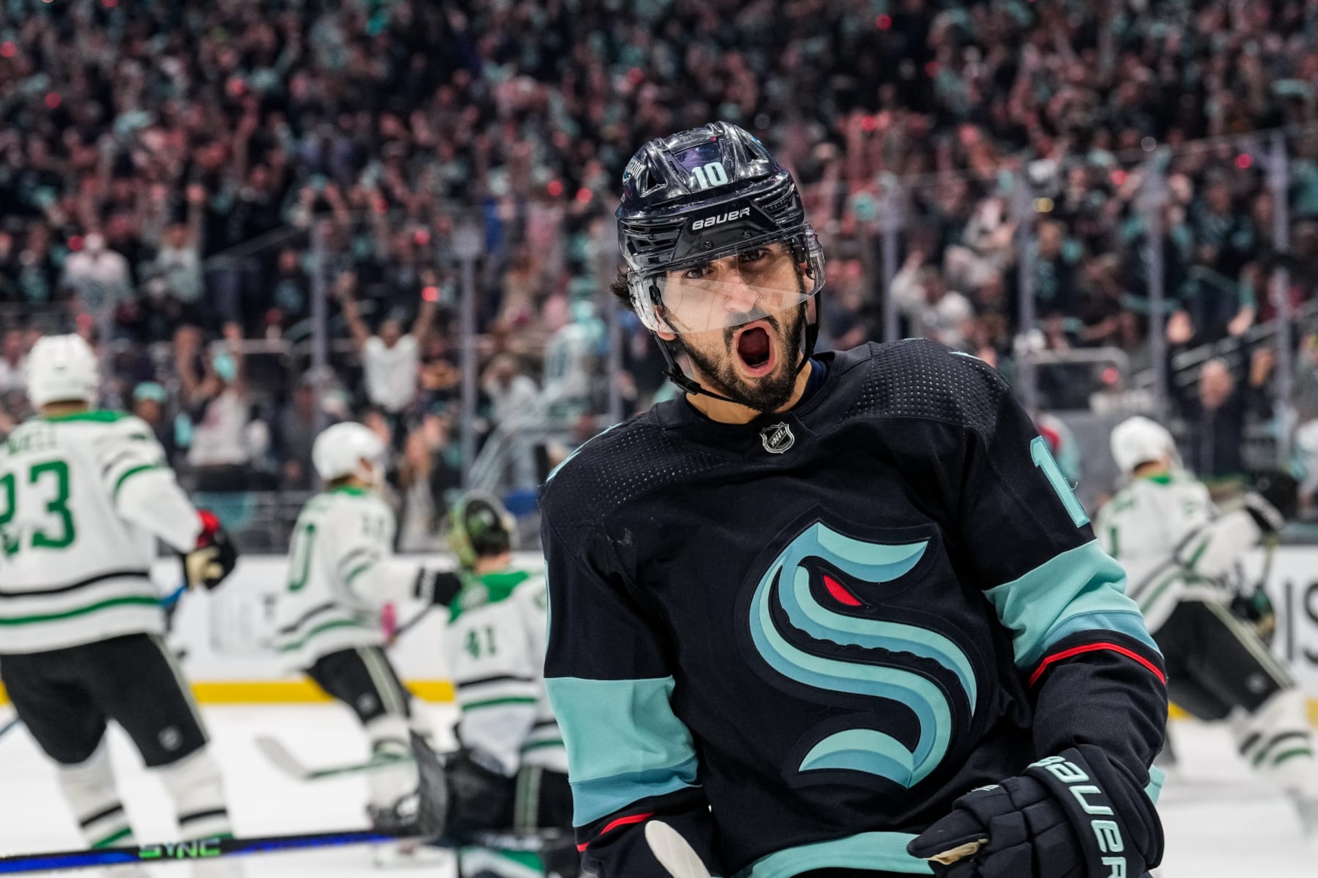 SEATTLE, WASHINGTON - MAY 12:Matty Beniers #10 of the Seattle Kraken celebrates scoring a goal against the Dallas Stars during the third period in Game Six of the Second Round of the 2023 Stanley Cup Playoffs at Climate Pledge Arena on May 12, 2023 in Seattle, Washington. (Photo by Christopher Mast/NHLI via Getty Images)
