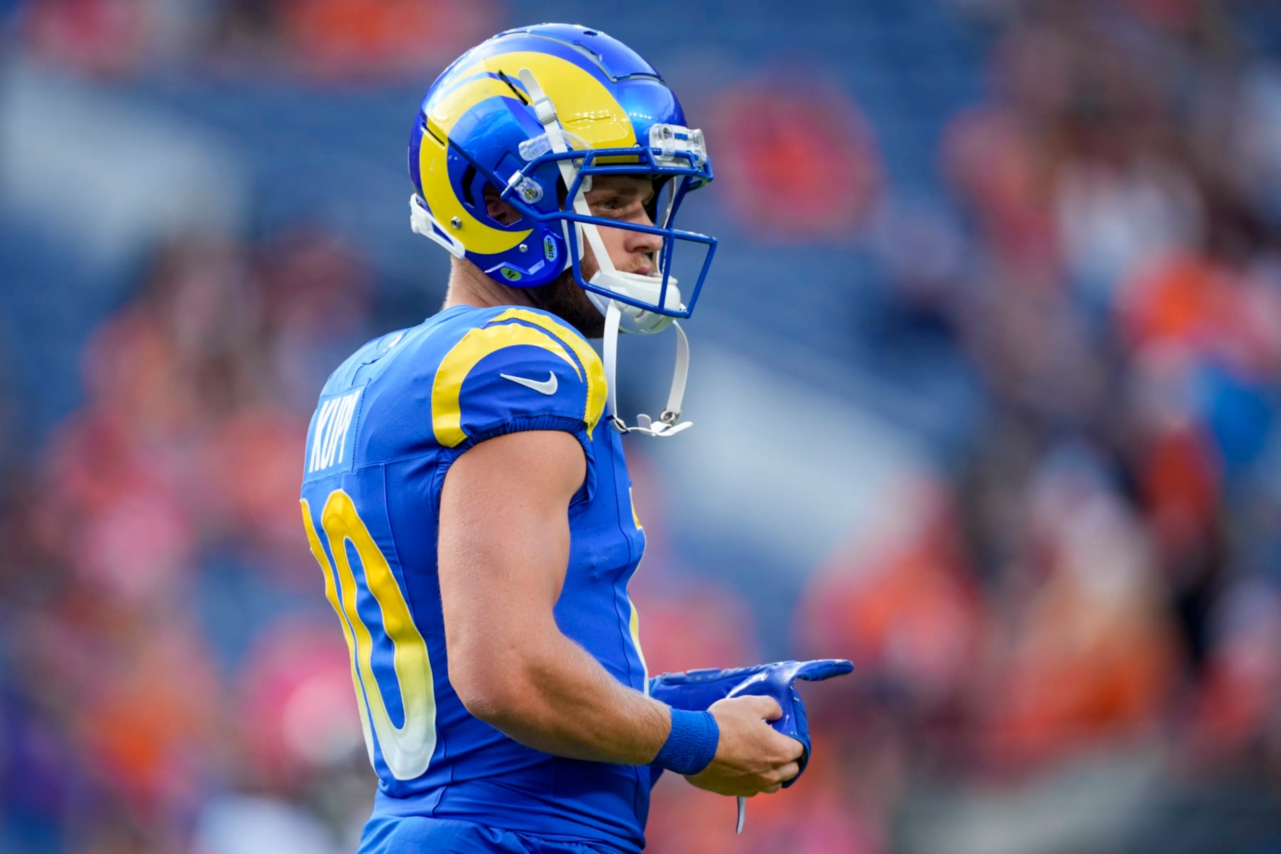 Los Angeles Rams wide receiver Cooper Kupp watches during warm ups before of an NFL preseason football game against the Denver Broncos Saturday, Aug. 26, 2023, in Denver. (AP Photo/David Zalubowski) Los Angeles Rams wide receiver Cooper Kupp watches during warm ups before of an NFL preseason football game against the Denver Broncos Saturday, Aug. 26, 2023, in Denver. (AP Photo/David Zalubowski)