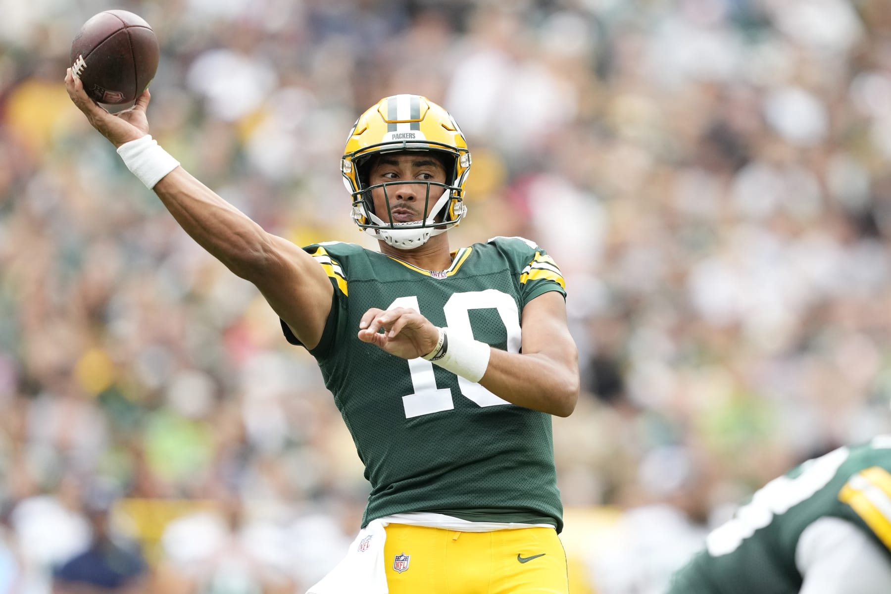 GREEN BAY, WISCONSIN - AUGUST 26: Jordan Love #10 of the Green Bay Packers throws a pass for a touchdown in the first half against the Seattle Seahawks during a preseason game at Lambeau Field on August 26, 2023 in Green Bay, Wisconsin. (Photo by Patrick McDermott/Getty Images)