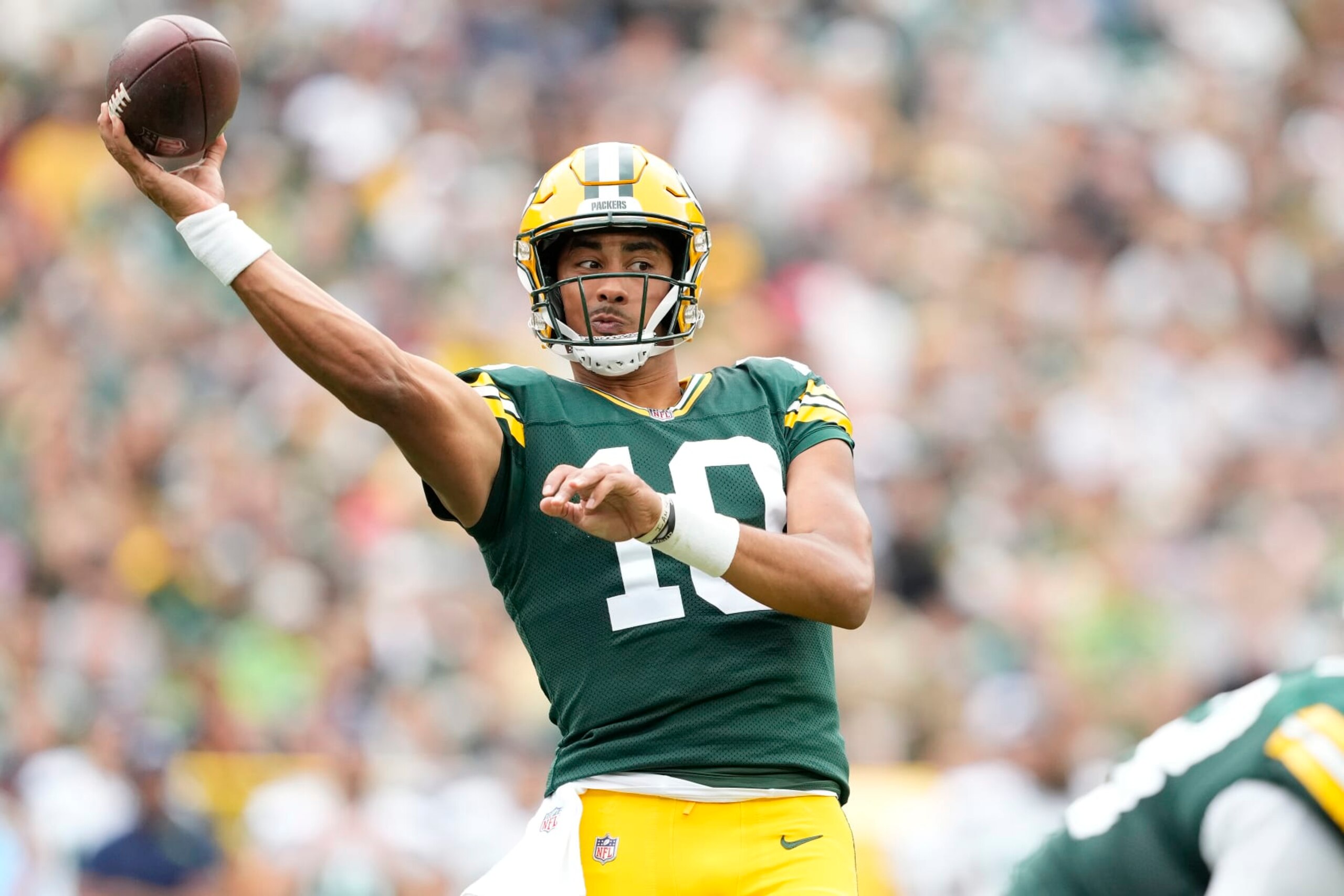 GREEN BAY, WISCONSIN - AUGUST 26: Jordan Love #10 of the Green Bay Packers throws a pass for a touchdown in the first half against the Seattle Seahawks during a preseason game at Lambeau Field on August 26, 2023 in Green Bay, Wisconsin. (Photo by Patrick McDermott/Getty Images)