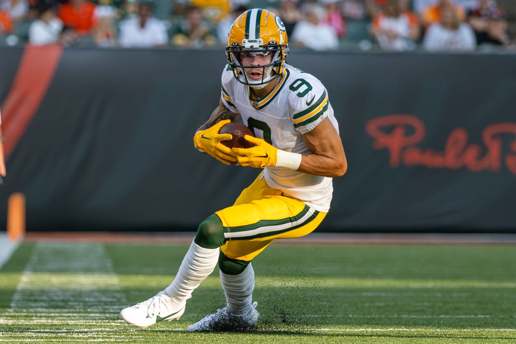 CINCINNATI, OHIO - AUGUST 11: Wide receiver Christian Watson #9 of the Green Bay Packers runs the ball during the game against the Cincinnati Bengals at Paycor Stadium on August 11, 2023 in Cincinnati, Ohio. (Photo by Michael Hickey/Getty Images)