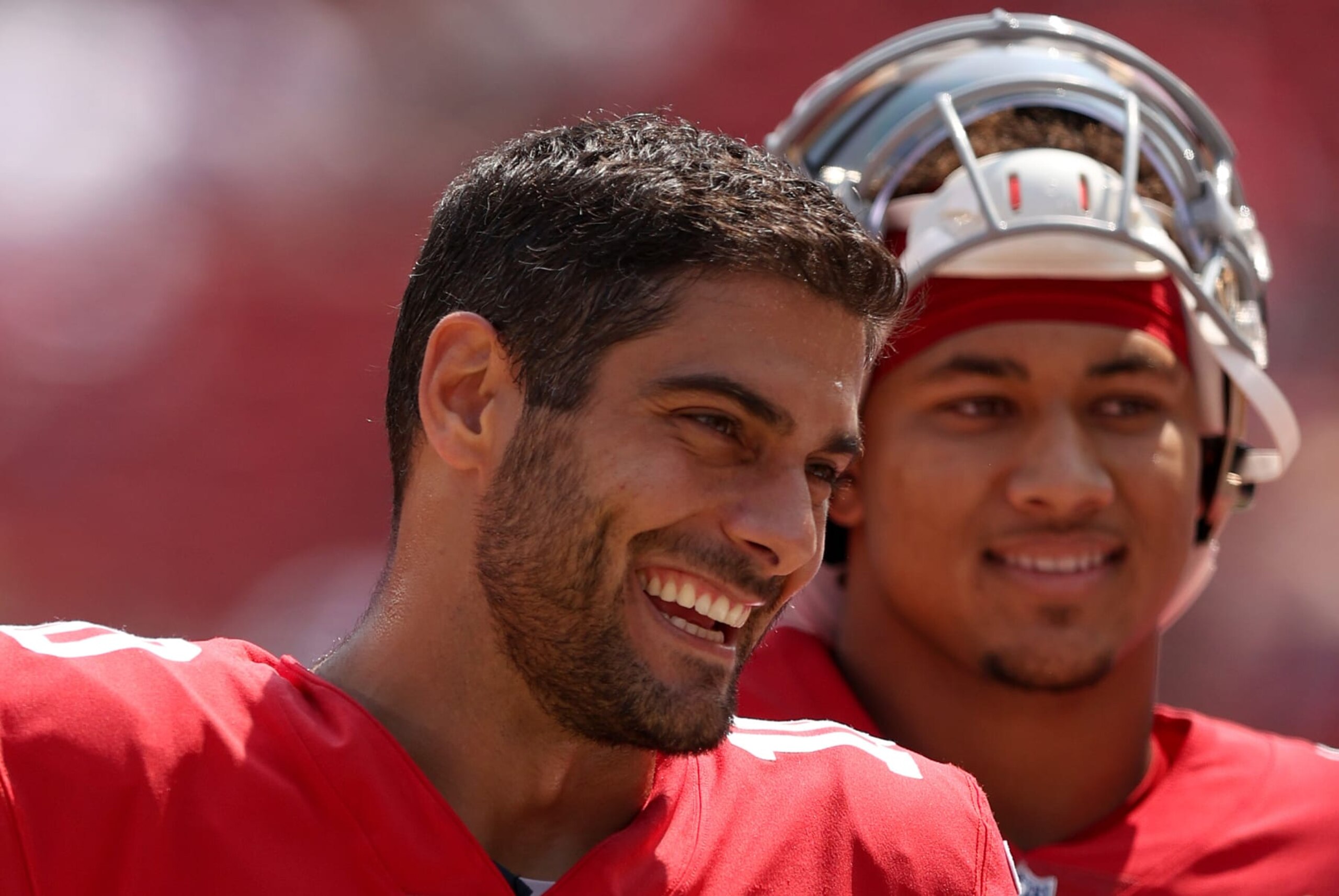 SANTA CLARA, CALIFORNIA - AUGUST 29: Jimmy Garoppolo #10 and Trey Lance #5 of the San Francisco 49ers talk to each other on the sidelines before their preseason game against the Las Vegas Raiders at Levi's Stadium on August 29, 2021 in Santa Clara, California. (Photo by Ezra Shaw/Getty Images) SANTA CLARA, CALIFORNIA - AUGUST 29: Jimmy Garoppolo #10 and Trey Lance #5 of the San Francisco 49ers talk to each other on the sidelines before their preseason game against the Las Vegas Raiders at Levi's Stadium on August 29, 2021 in Santa Clara, California. (Photo by Ezra Shaw/Getty Images)