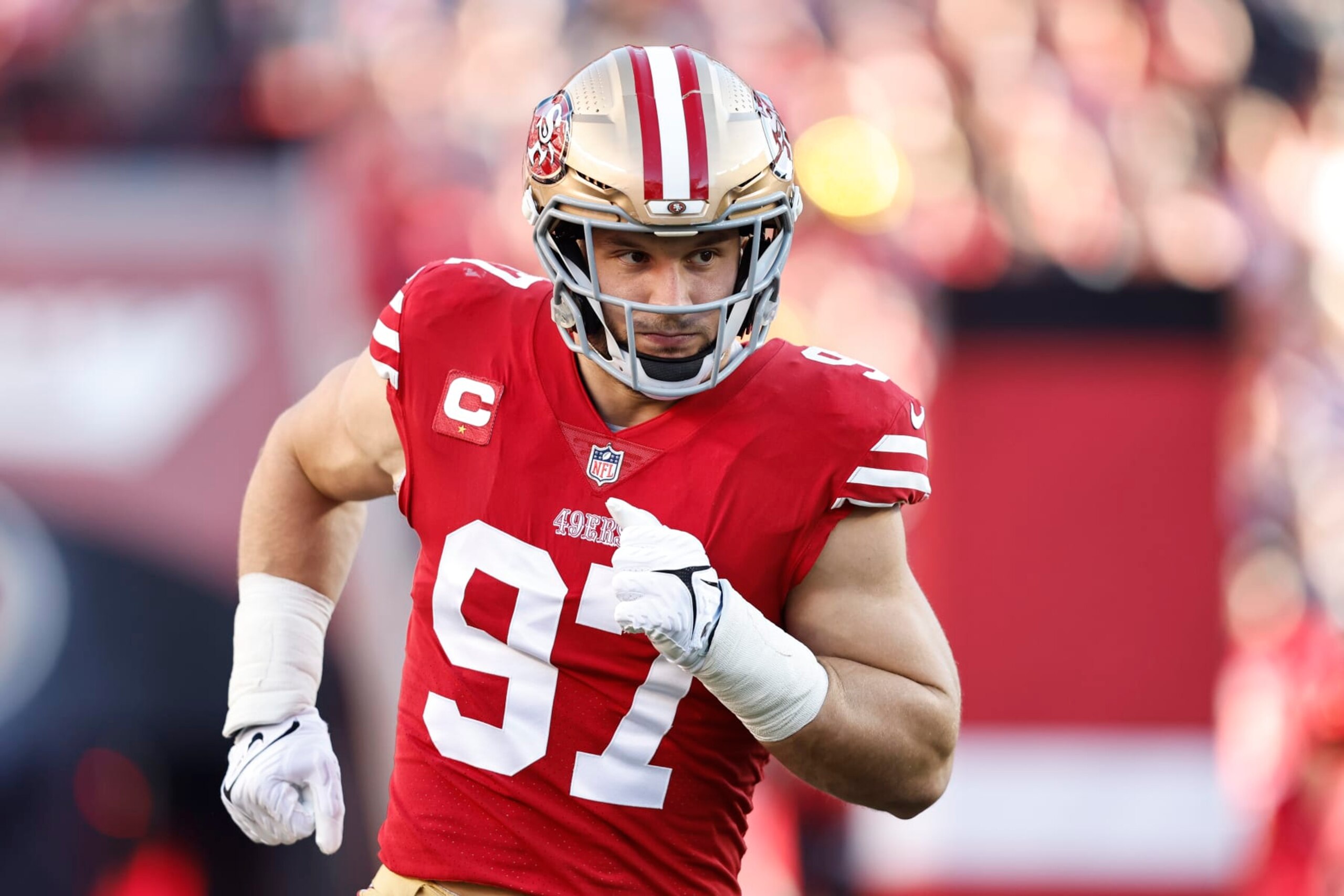 SANTA CLARA, CALIFORNIA - JANUARY 22: Nick Bosa #97 of the San Francisco 49ers runs as he takes the field prior to an NFL divisional round playoff football game between the San Francisco 49ers and the Dallas Cowboys at Levi's Stadium on January 22, 2023 in Santa Clara, California. (Photo by Michael Owens/Getty Images)