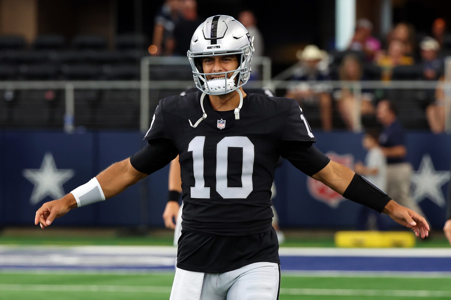 ARLINGTON, TEXAS - AUGUST 26: Jimmy Garoppolo #10 of the Las Vegas Raiders warms up before a preseason game against the Dallas Cowboys at AT&T Stadium on August 26, 2023 in Arlington, Texas. (Photo by Richard Rodriguez/Getty Images)