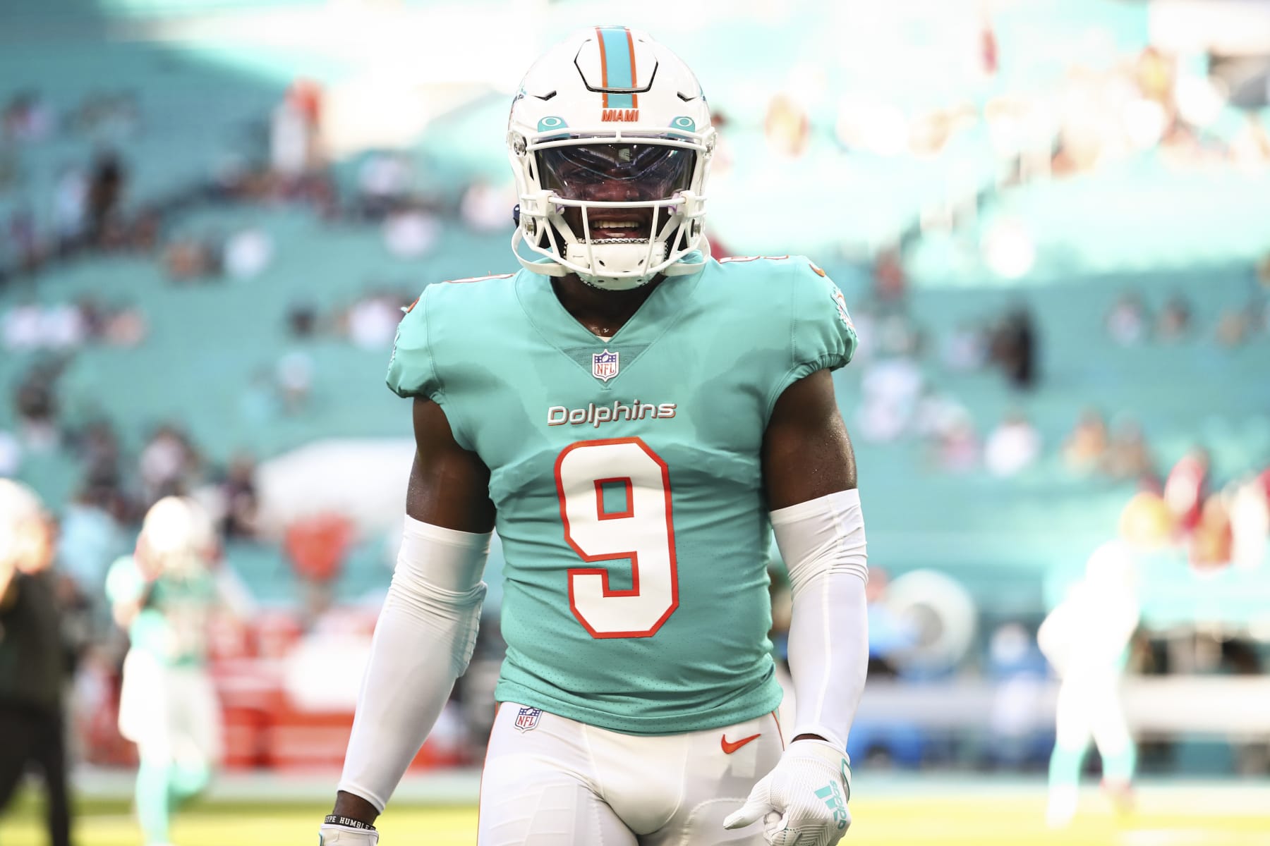 MIAMI GARDENS, FL - AUGUST 21: Noah Igbinoghene #9 of the Miami Dolphins smiles prior to an NFL preseason game against the Atlanta Falcons at Hard Rock Stadium on August 21, 2021 in Miami Gardens, Florida. (Photo by Kevin Sabitus/Getty Images)