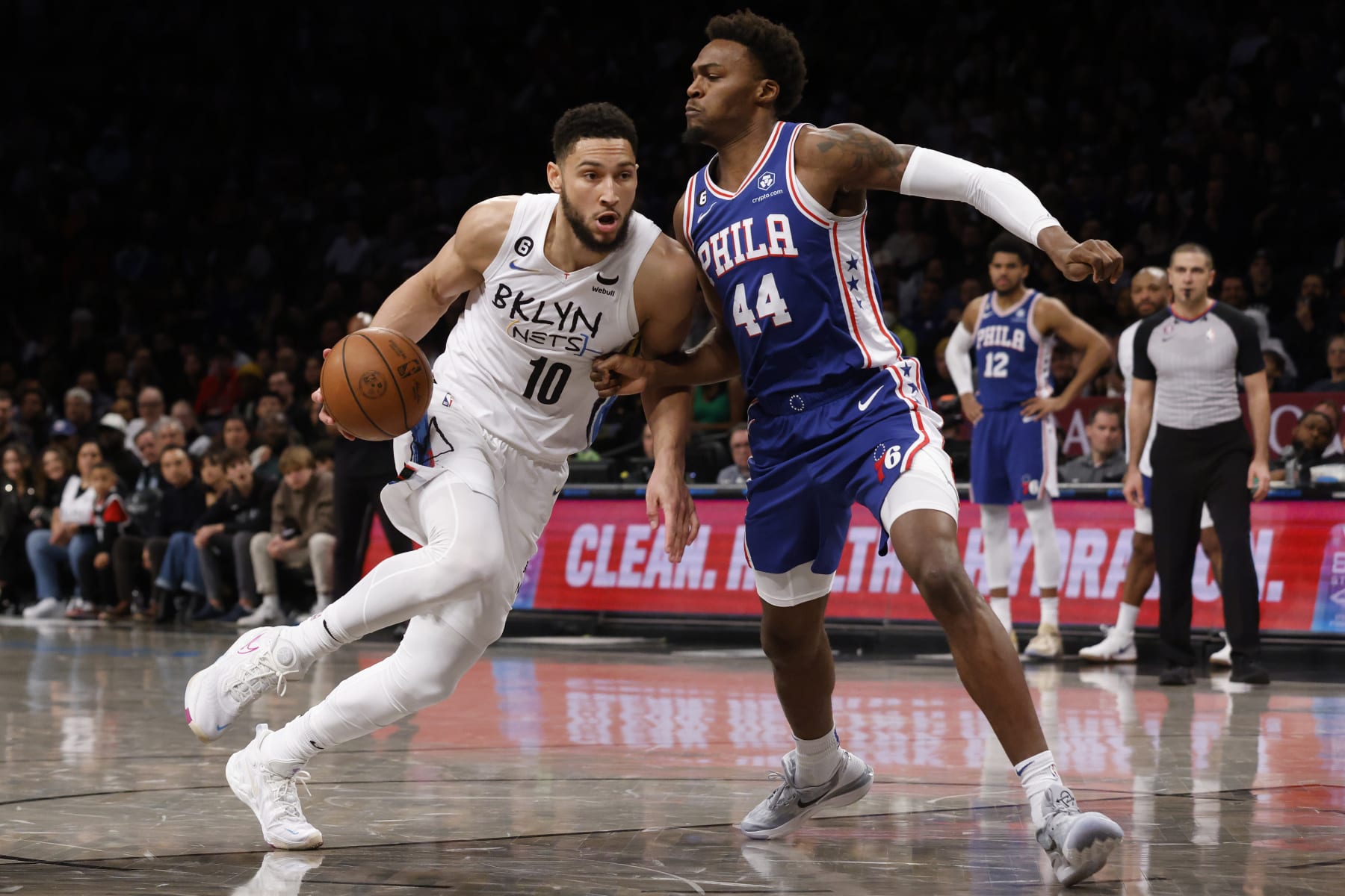 Brooklyn Nets' Ben Simmons (10), of Australia, drives against Philadelphia 76ers' Paul Reed (44) during the fourth quarter of an NBA basketball game Saturday, Feb. 11, 2023, in New York. (AP Photo/Jason DeCrow)