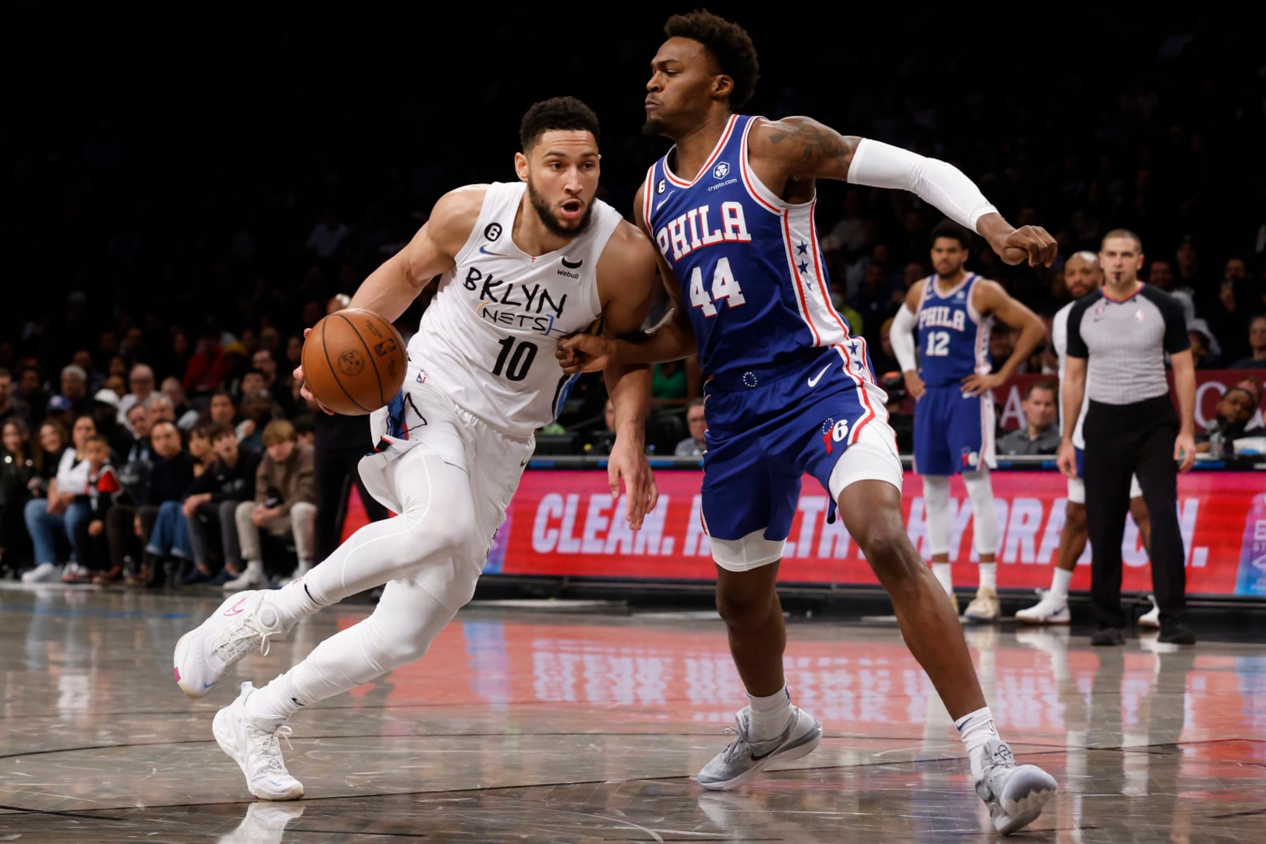 Brooklyn Nets' Ben Simmons (10), of Australia, drives against Philadelphia 76ers' Paul Reed (44) during the fourth quarter of an NBA basketball game Saturday, Feb. 11, 2023, in New York. (AP Photo/Jason DeCrow)