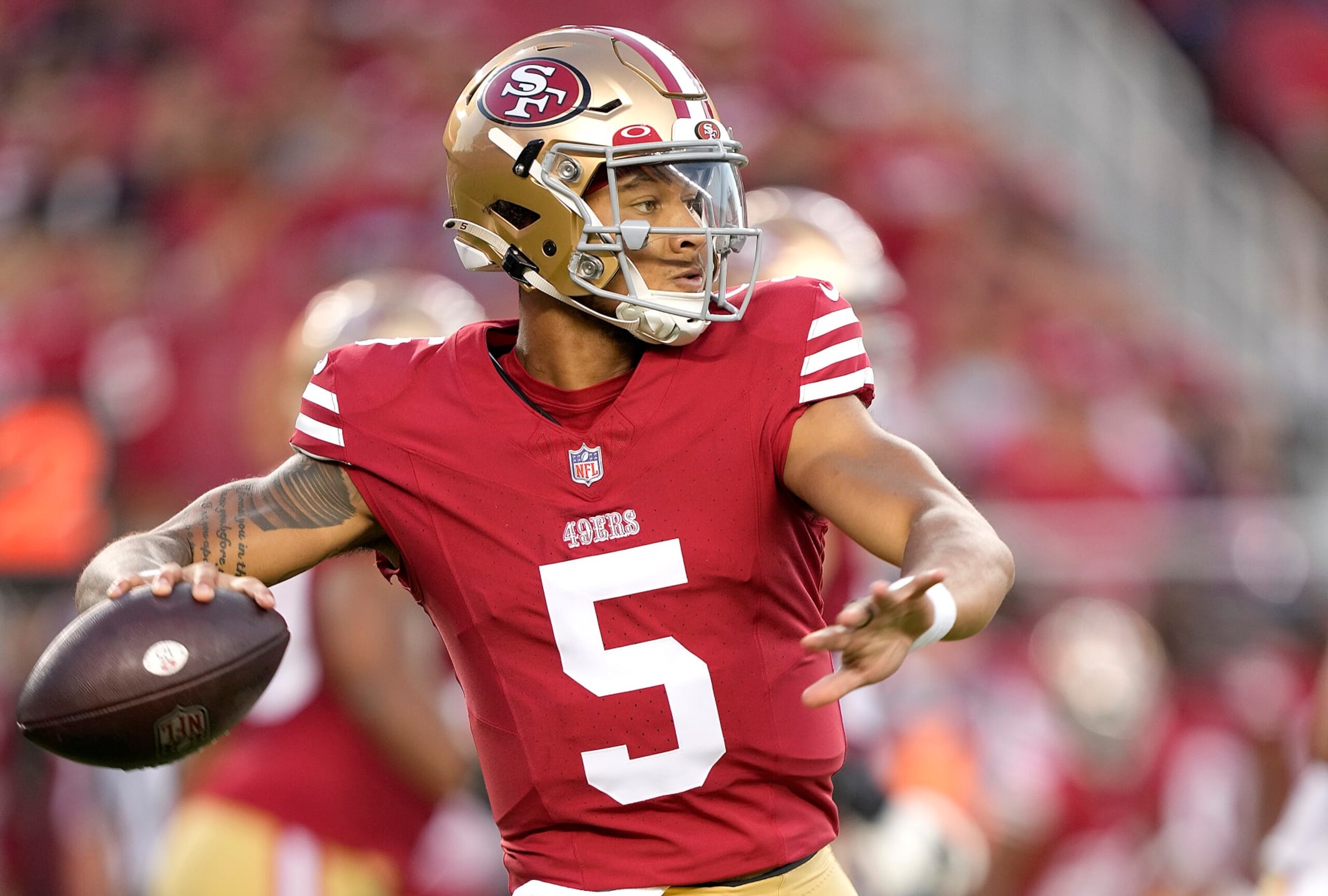 SANTA CLARA, CALIFORNIA - AUGUST 19: Trey Lance #5 of the San Francisco 49ers looks to pass the ball against the Denver Broncos in the fourth quarter at Levi's Stadium on August 19, 2023 in Santa Clara, California. (Photo by Thearon W. Henderson/Getty Images)