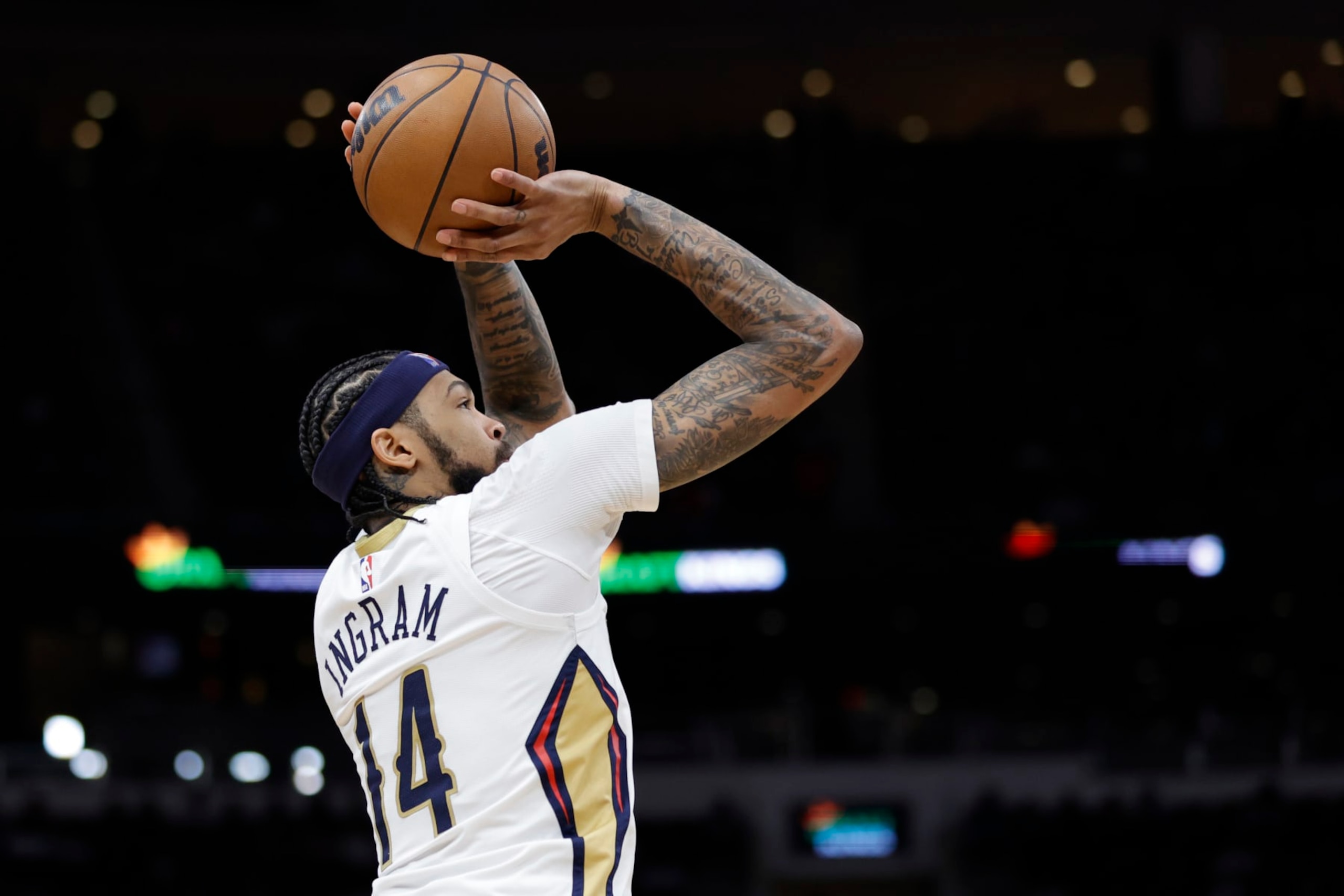 HOUSTON, TEXAS - MARCH 17: Brandon Ingram #14 of the New Orleans Pelicans shoots a basket against the Houston Rockets during the first half at Toyota Center on March 17, 2023 in Houston, Texas. NOTE TO USER: User expressly acknowledges and agrees that, by downloading and or using this photograph, User is consenting to the terms and conditions of the Getty Images License Agreement. (Photo by Carmen Mandato/Getty Images)