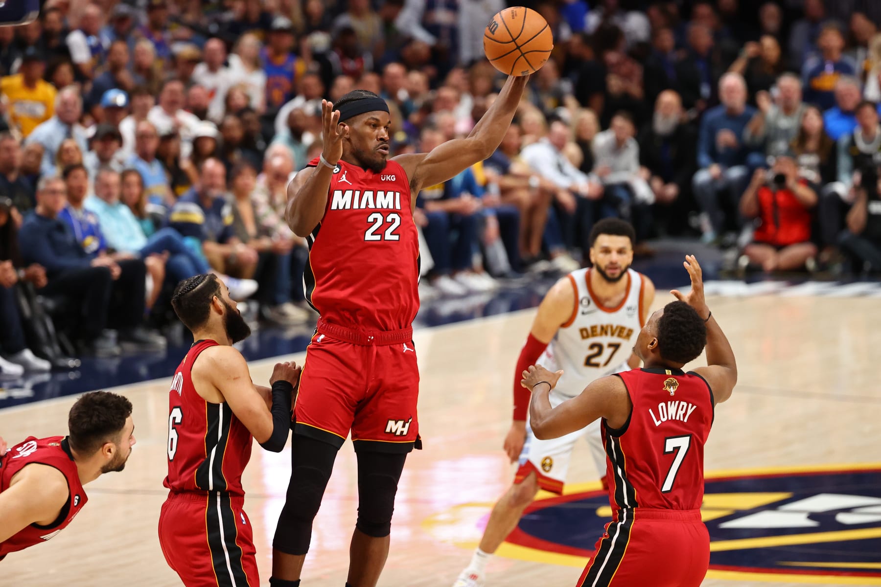 DENVER, CO - JUNE 12: Jimmy Butler #22 of the Miami Heat rebounds the ball during game 5 of the 2023 NBA Finals against the Denver Nuggets on June 12, 2023 at the Ball Arena in Denver, Colorado. NOTE TO USER: User expressly acknowledges and agrees that, by downloading and/or using this Photograph, user is consenting to the terms and conditions of the Getty Images License Agreement. Mandatory Copyright Notice: Copyright 2023 NBAE (Photo by Jamie Schwaberow/NBAE via Getty Images)