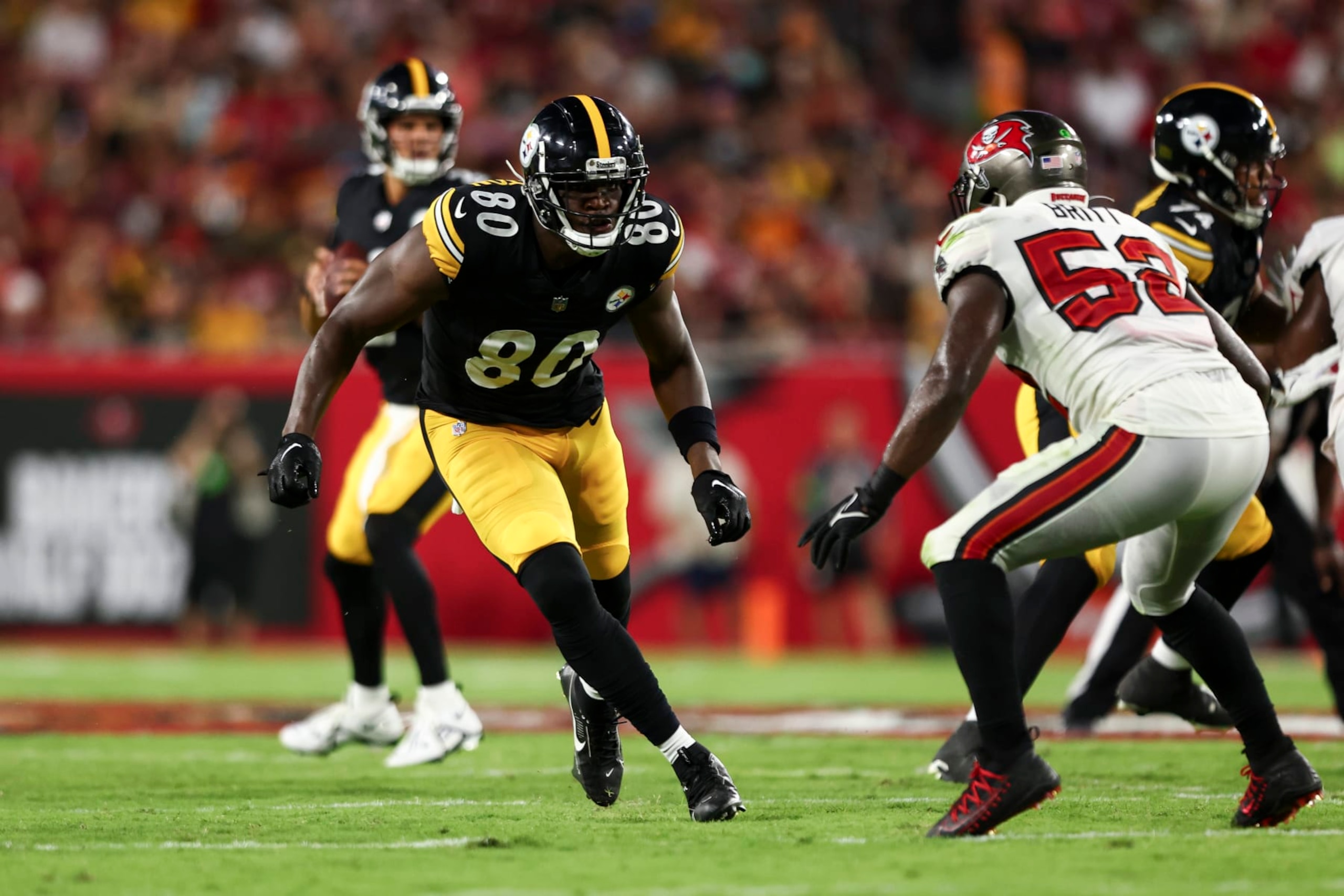 TAMPA, FL - AUGUST 11: Darnell Washington #80 of the Pittsburgh Steelers runs downfield during an NFL preseason football game against the Tampa Bay Buccaneers at Raymond James Stadium on August 11, 2023 in Tampa, Florida. (Photo by Kevin Sabitus/Getty Images)