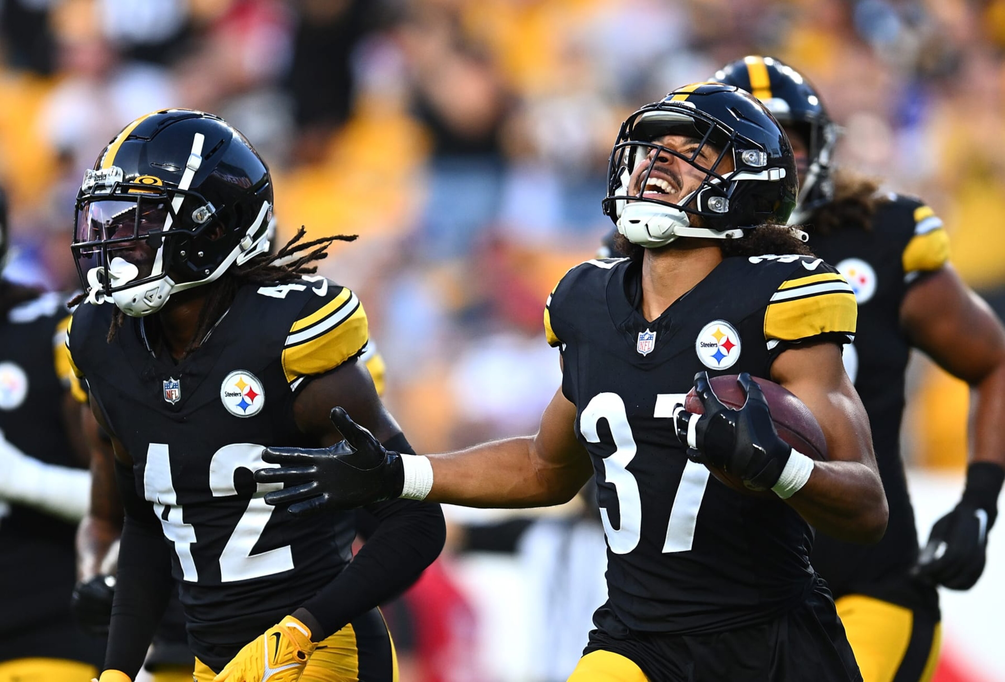 PITTSBURGH, PENNSYLVANIA - AUGUST 19:  Elijah Riley #37 of the Pittsburgh Steelers celebrates after intercepting a pass during the second quarter of a preseason game against the Buffalo Bills at Acrisure Stadium on August 19, 2023 in Pittsburgh, Pennsylvania. (Photo by Joe Sargent/Getty Images)