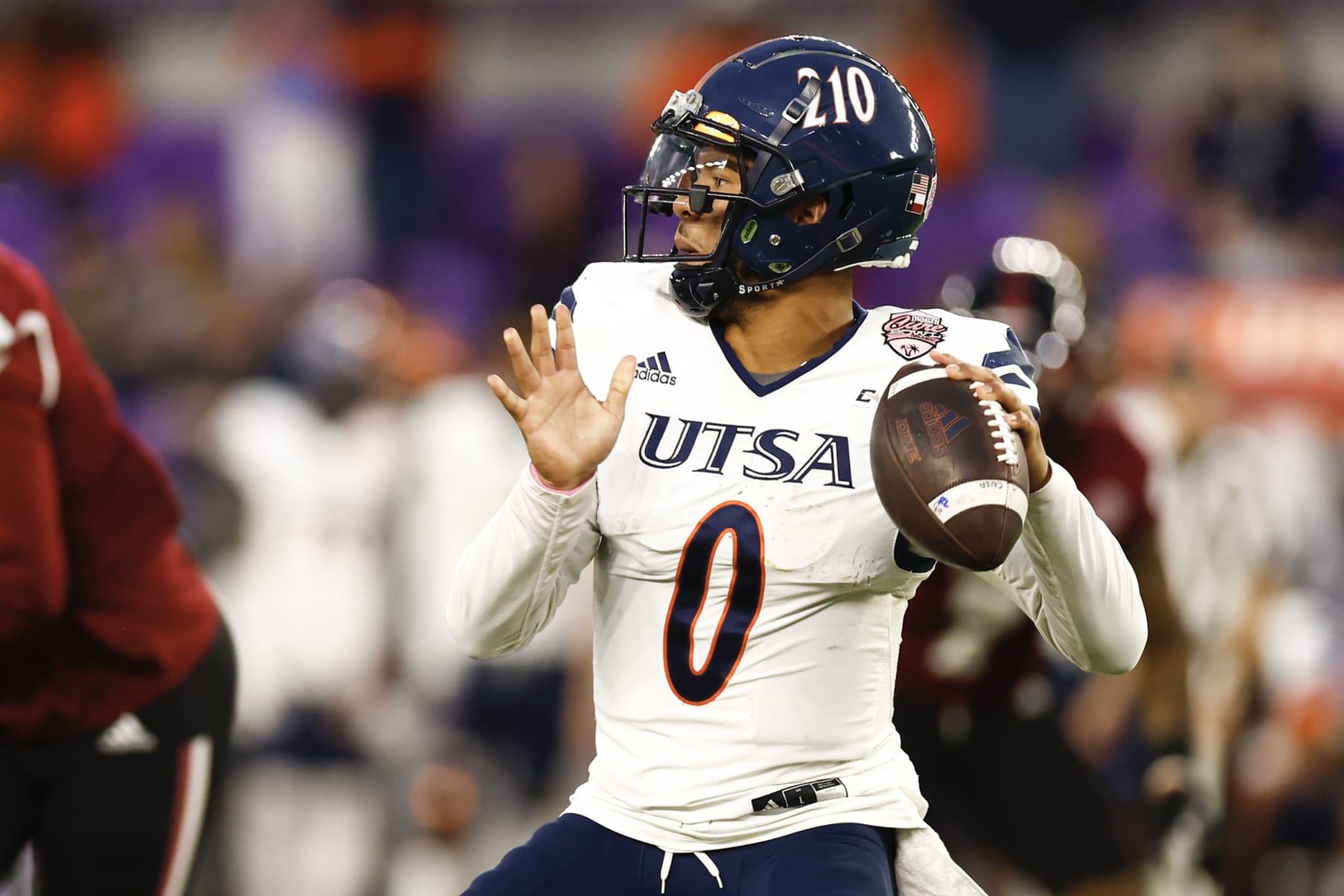 ORLANDO, FLORIDA - DECEMBER 16: Frank Harris #0 of the UTSA Roadrunners look to pass the ball against the Troy Trojans /d3 of the Duluth Trading Cure Bowl at Exploria Stadium on December 16, 2022 in Orlando, Florida. (Photo by Douglas P. DeFelice/Getty Images)