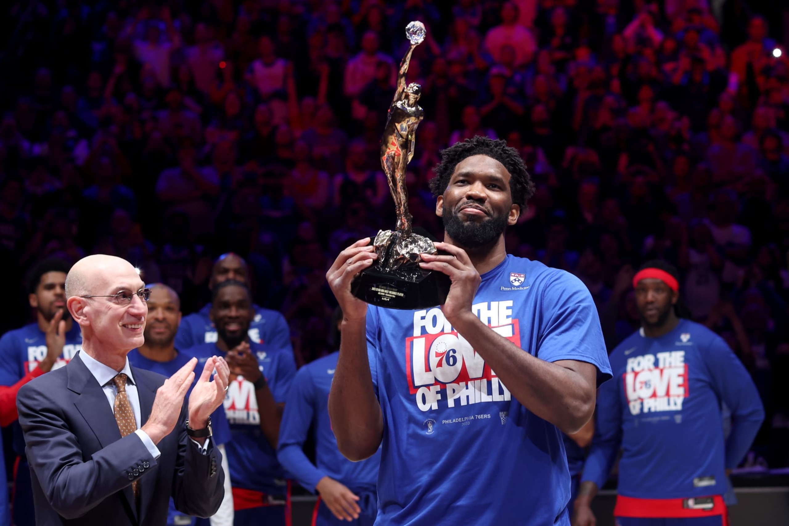 PHILADELPHIA, PENNSYLVANIA - MAY 05: Joel Embiid #21 of the Philadelphia 76ers hoist the MVP trophy after being named 2022-23 Kia NBA Most Valuable Player prior to game three of the Eastern Conference Second Round Playoffs against the Boston Celtics at Wells Fargo Center on May 05, 2023 in Philadelphia, Pennsylvania. NOTE TO USER: User expressly acknowledges and agrees that, by downloading and or using this photograph, User is consenting to the terms and conditions of the Getty Images License Agreement. (Photo by Tim Nwachukwu/Getty Images)