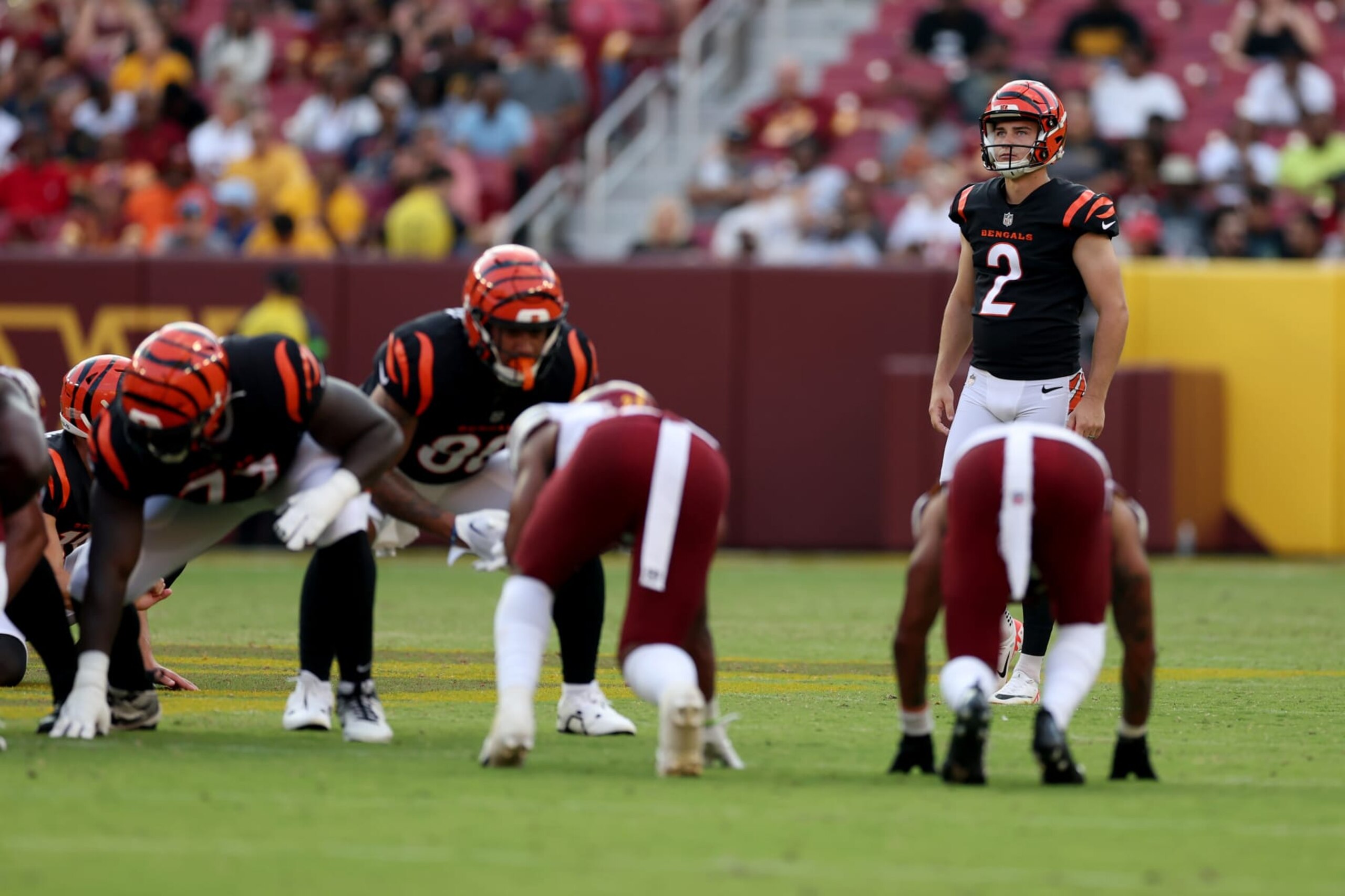LANDOVER, MARYLAND - AUGUST 26: Place kicker Evan McPherson #2 of the Cincinnati Bengals lines up to kick a field goal against the Washington Commanders during a preseason game at FedExField on August 26, 2023 in Landover, Maryland. (Photo by Rob Carr/Getty Images) LANDOVER, MARYLAND - AUGUST 26: Place kicker Evan McPherson #2 of the Cincinnati Bengals lines up to kick a field goal against the Washington Commanders during a preseason game at FedExField on August 26, 2023 in Landover, Maryland. (Photo by Rob Carr/Getty Images)