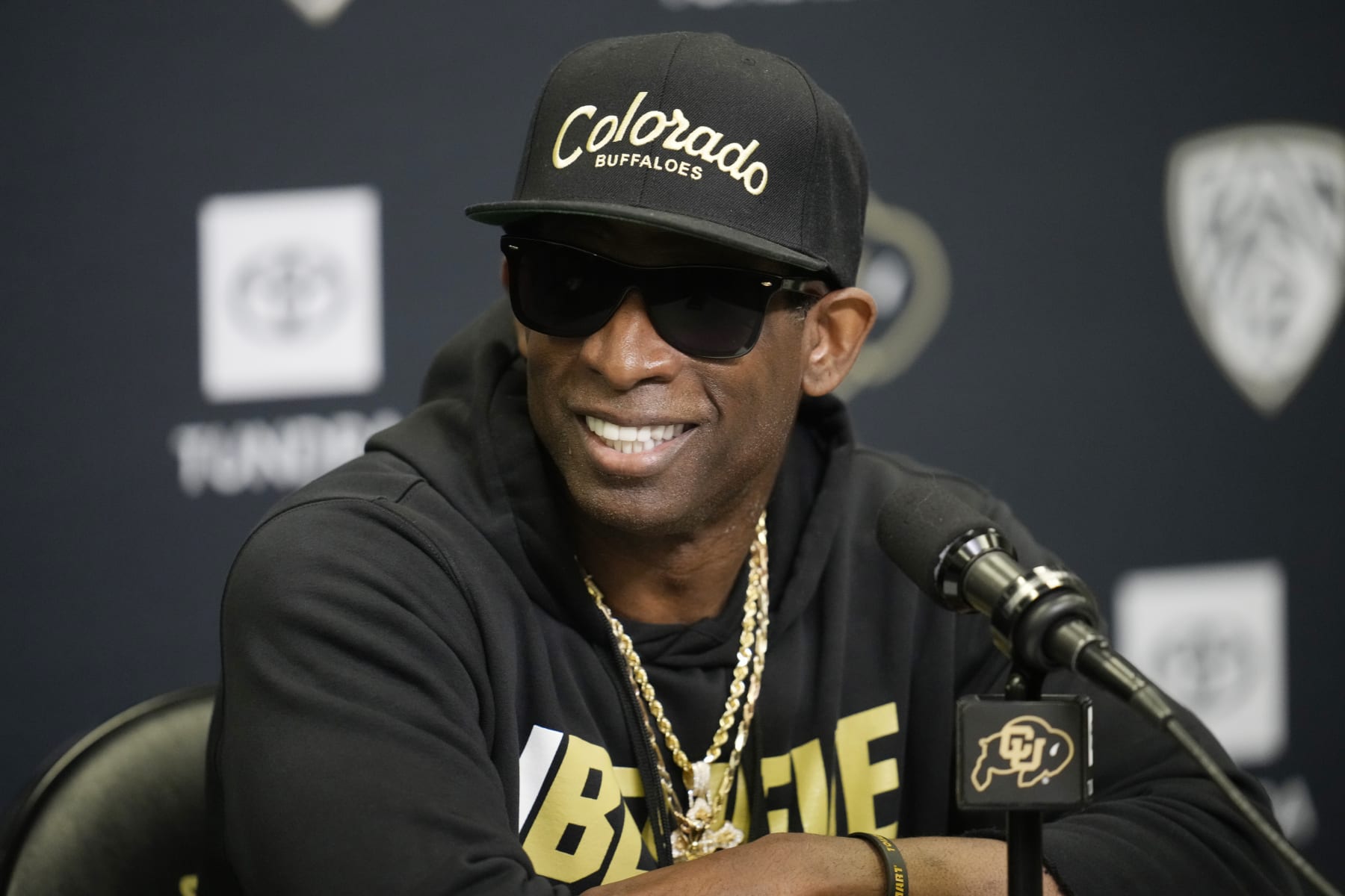 Colorado head coach Deion Sanders responds to questions during a news conference after the team's NCAA college football practice at the university Friday, Aug. 4, 2023, in Boulder, Colo. (AP Photo/David Zalubowski)