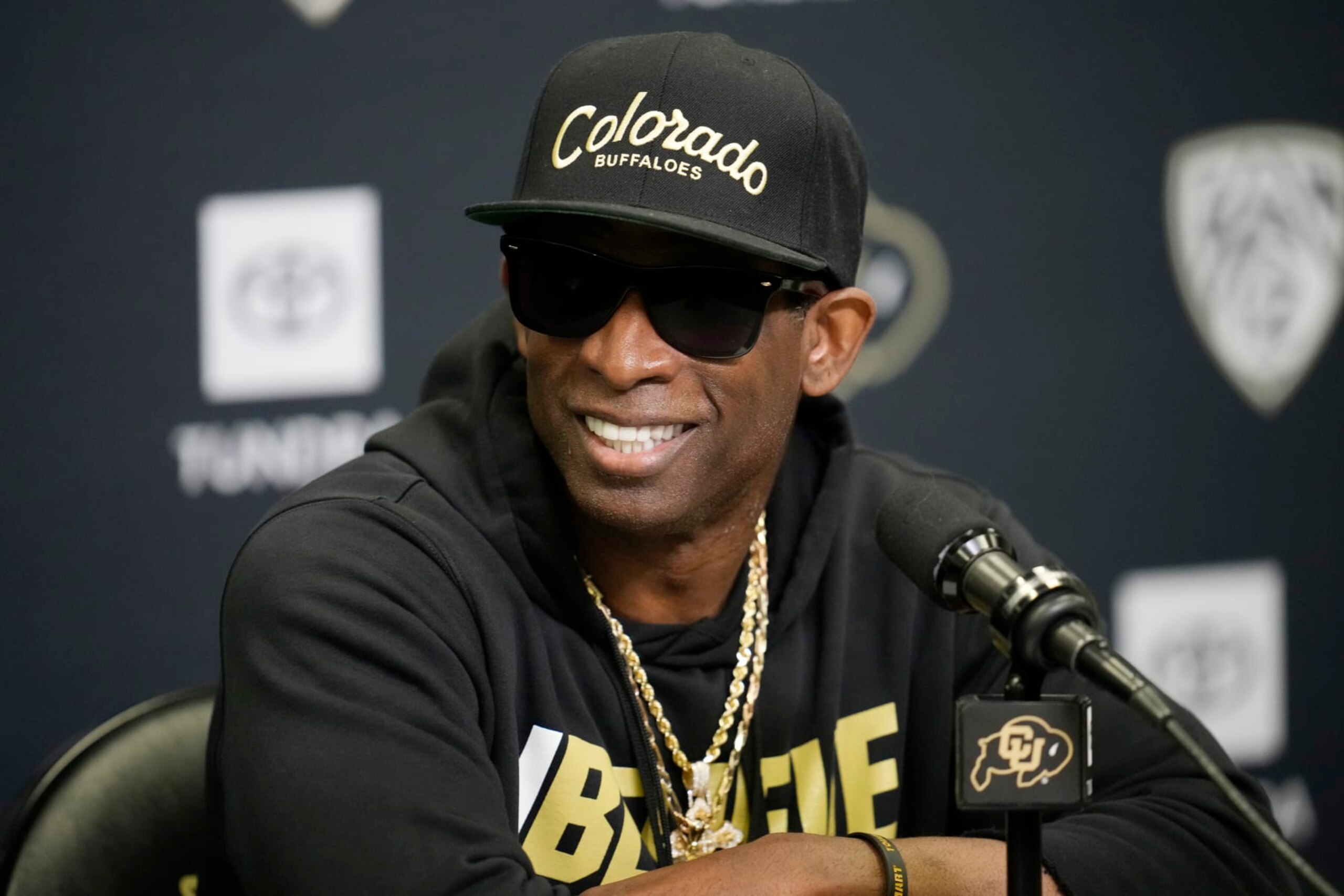 Colorado head coach Deion Sanders responds to questions during a news conference after the team's NCAA college football practice at the university Friday, Aug. 4, 2023, in Boulder, Colo. (AP Photo/David Zalubowski)