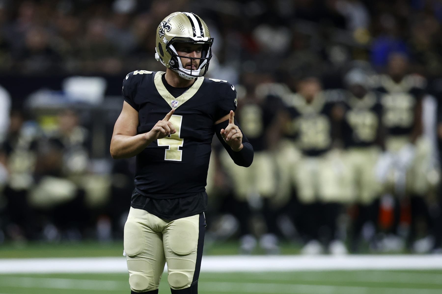 NEW ORLEANS, LOUISIANA - AUGUST 13: Derek Carr #4 of the New Orleans Saints looks on during the preseason game against the Kansas City Chiefs at Caesars Superdome on August 13, 2023 in New Orleans, Louisiana. (Photo by Chris Graythen/Getty Images)