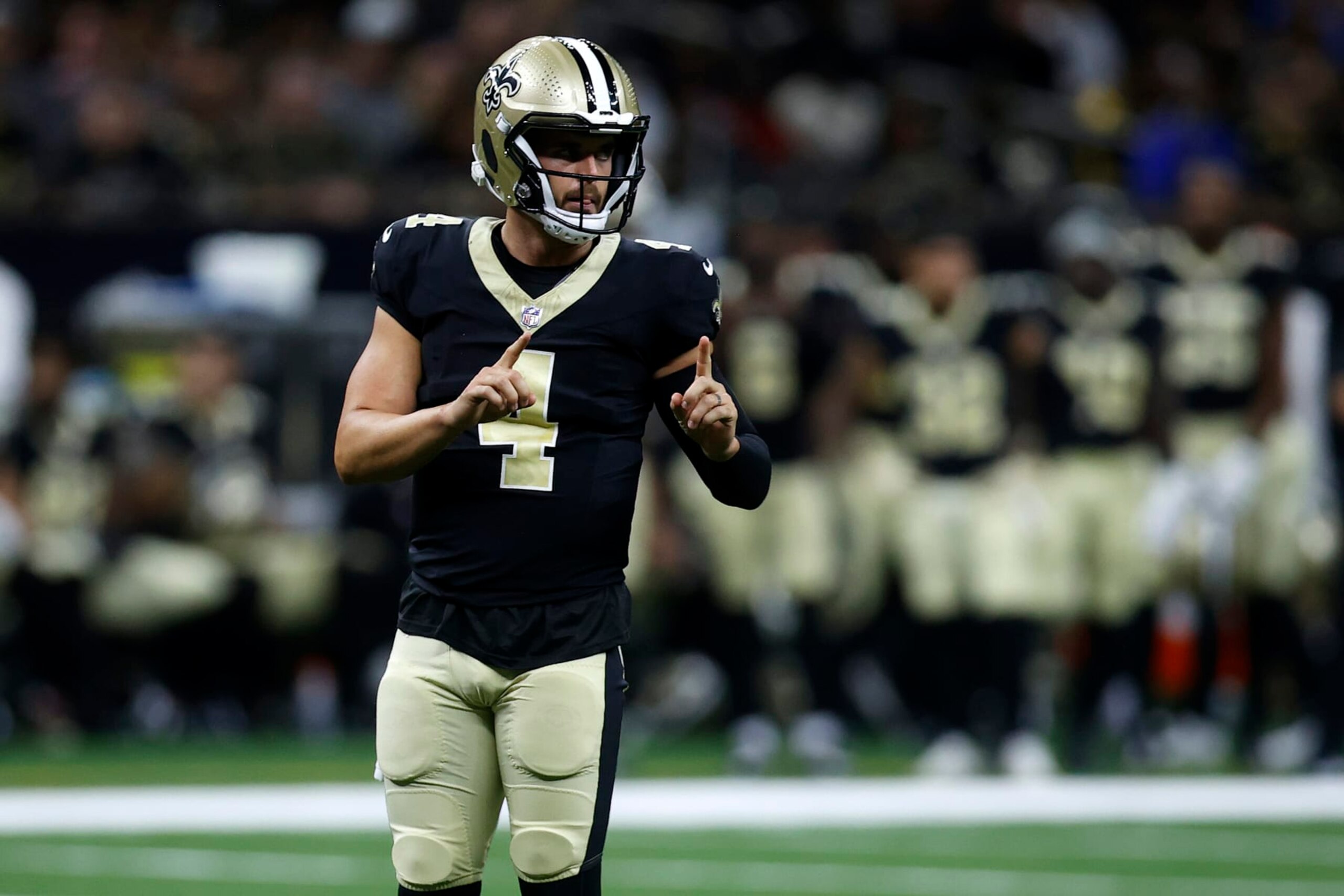 NEW ORLEANS, LOUISIANA - AUGUST 13: Derek Carr #4 of the New Orleans Saints looks on during the preseason game against the Kansas City Chiefs at Caesars Superdome on August 13, 2023 in New Orleans, Louisiana. (Photo by Chris Graythen/Getty Images)