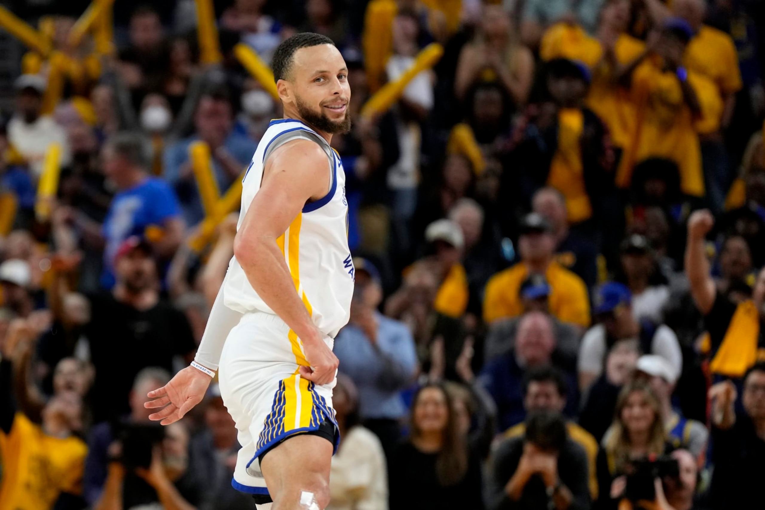 SAN FRANCISCO, CALIFORNIA - MAY 10: Stephen Curry #30 of the Golden State Warriors reacts after scoring during the fourth quarter against the Los Angeles Lakers in game five of the Western Conference Semifinal Playoffs at Chase Center on May 10, 2023 in San Francisco, California. NOTE TO USER: User expressly acknowledges and agrees that, by downloading and or using this photograph, User is consenting to the terms and conditions of the Getty Images License Agreement. (Photo by Thearon W. Henderson/Getty Images)