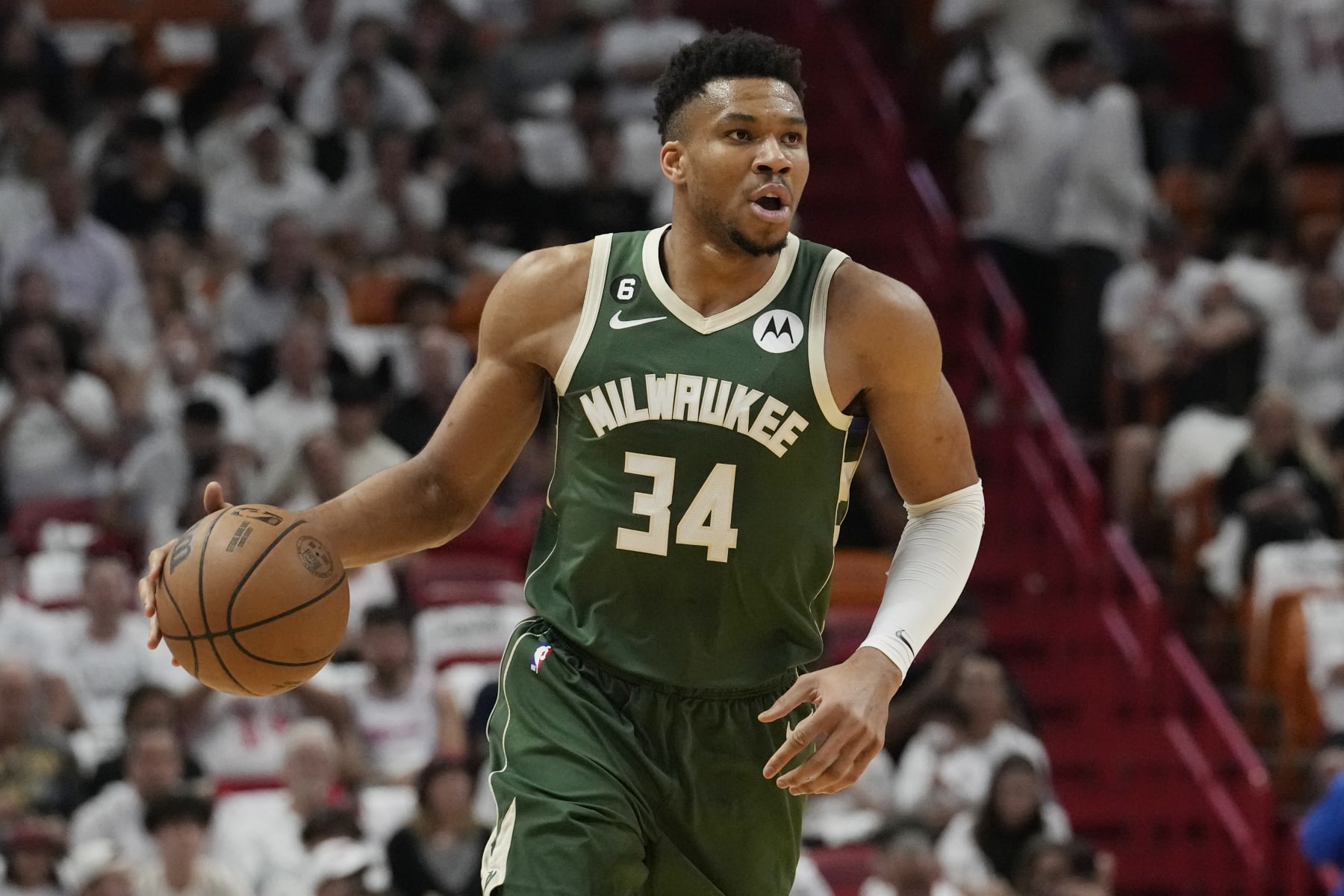 FILE -Milwaukee Bucks forward Giannis Antetokounmpo (34) dribbles the ball during the first half of Game 4 in a first-round NBA basketball playoff series against the Miami Heat, Monday, April 24, 2023, in Miami. Bucks forward Giannis Antetokounmpo has undergone surgery on his left knee during the offseason, but new Milwaukee coach Adrian Griffin says the two-time MVP still should be available during training camp. Griffin confirmed Wednesday, July 5, 2023 after a practice by the Bucks’ summer league team that Antetokounmpo had undergone the procedure. (AP Photo/Marta Lavandier, File)