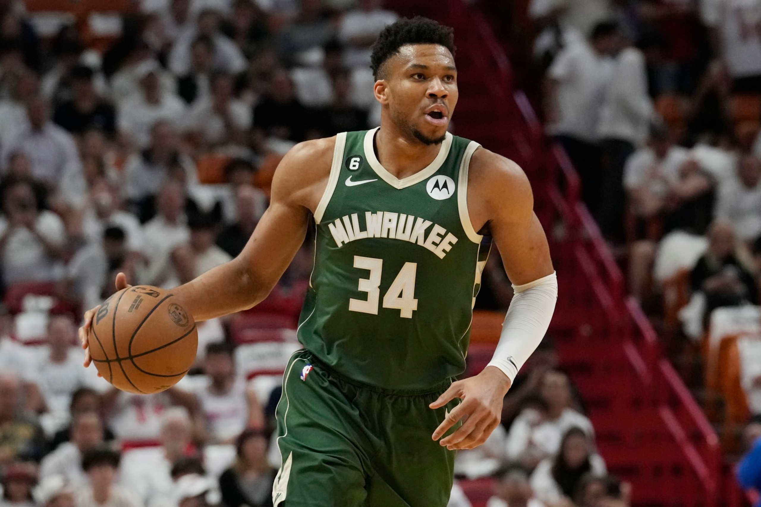 FILE -Milwaukee Bucks forward Giannis Antetokounmpo (34) dribbles the ball during the first half of Game 4 in a first-round NBA basketball playoff series against the Miami Heat, Monday, April 24, 2023, in Miami. Bucks forward Giannis Antetokounmpo has undergone surgery on his left knee during the offseason, but new Milwaukee coach Adrian Griffin says the two-time MVP still should be available during training camp. Griffin confirmed Wednesday, July 5, 2023 after a practice by the Bucks’ summer league team that Antetokounmpo had undergone the procedure. (AP Photo/Marta Lavandier, File)