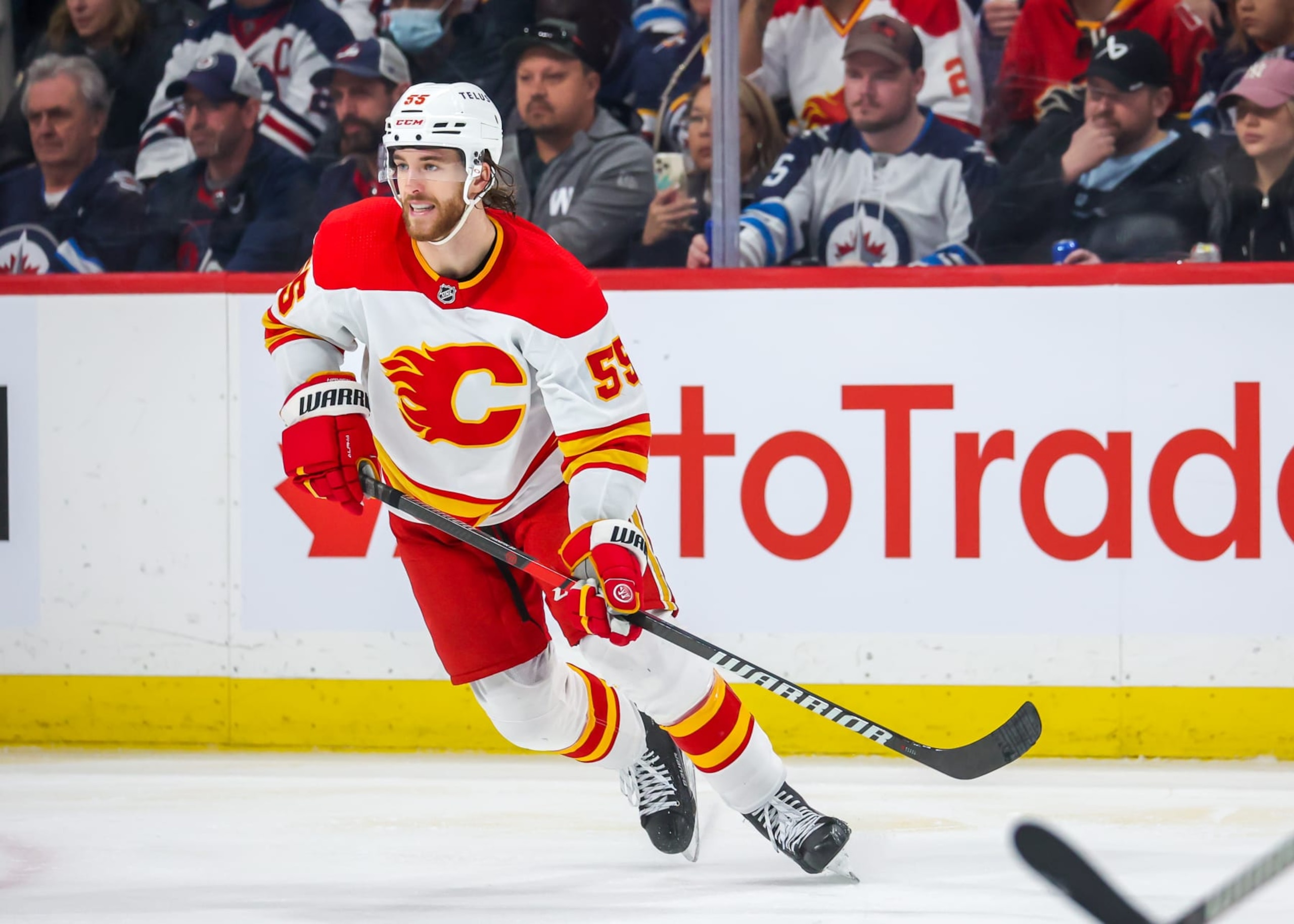 WINNIPEG, CANADA - APRIL 05: Noah Hanifin #55 of the Calgary Flames skates during third period action against the Winnipeg Jets at Canada Life Centre on April 05, 2023 in Winnipeg, Manitoba, Canada. (Photo by Jonathan Kozub/NHLI via Getty Images) WINNIPEG, CANADA - APRIL 05: Noah Hanifin #55 of the Calgary Flames skates during third period action against the Winnipeg Jets at Canada Life Centre on April 05, 2023 in Winnipeg, Manitoba, Canada. (Photo by Jonathan Kozub/NHLI via Getty Images)