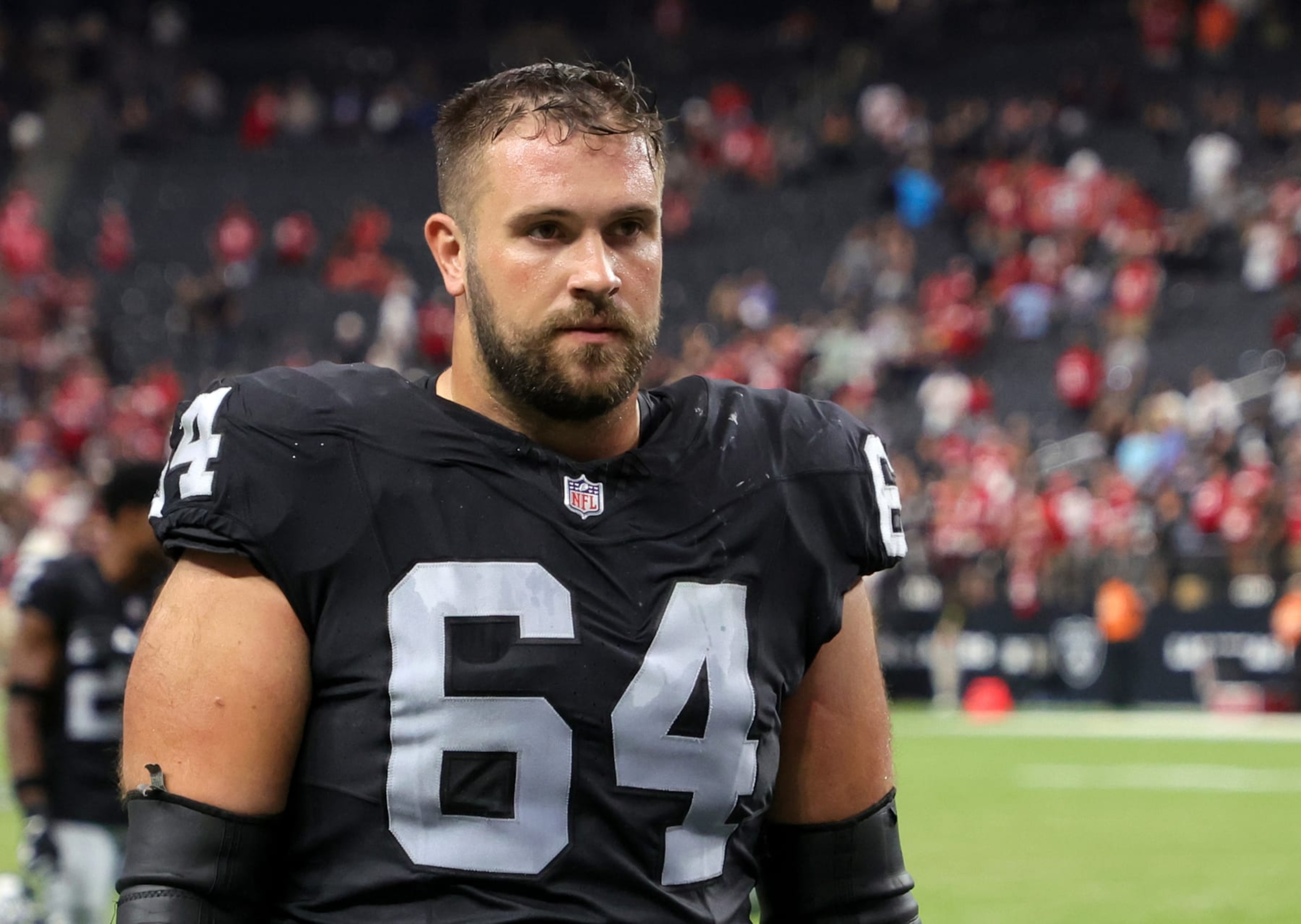 LAS VEGAS, NEVADA - AUGUST 13: Guard Alex Bars #64 of the Las Vegas Raiders leaves the field after the Raiders' 34-7 victory over the San Francisco 49ers in a preseason game at Allegiant Stadium on August 13, 2023 in Las Vegas, Nevada. (Photo by Ethan Miller/Getty Images) LAS VEGAS, NEVADA - AUGUST 13: Guard Alex Bars #64 of the Las Vegas Raiders leaves the field after the Raiders' 34-7 victory over the San Francisco 49ers in a preseason game at Allegiant Stadium on August 13, 2023 in Las Vegas, Nevada. (Photo by Ethan Miller/Getty Images)
