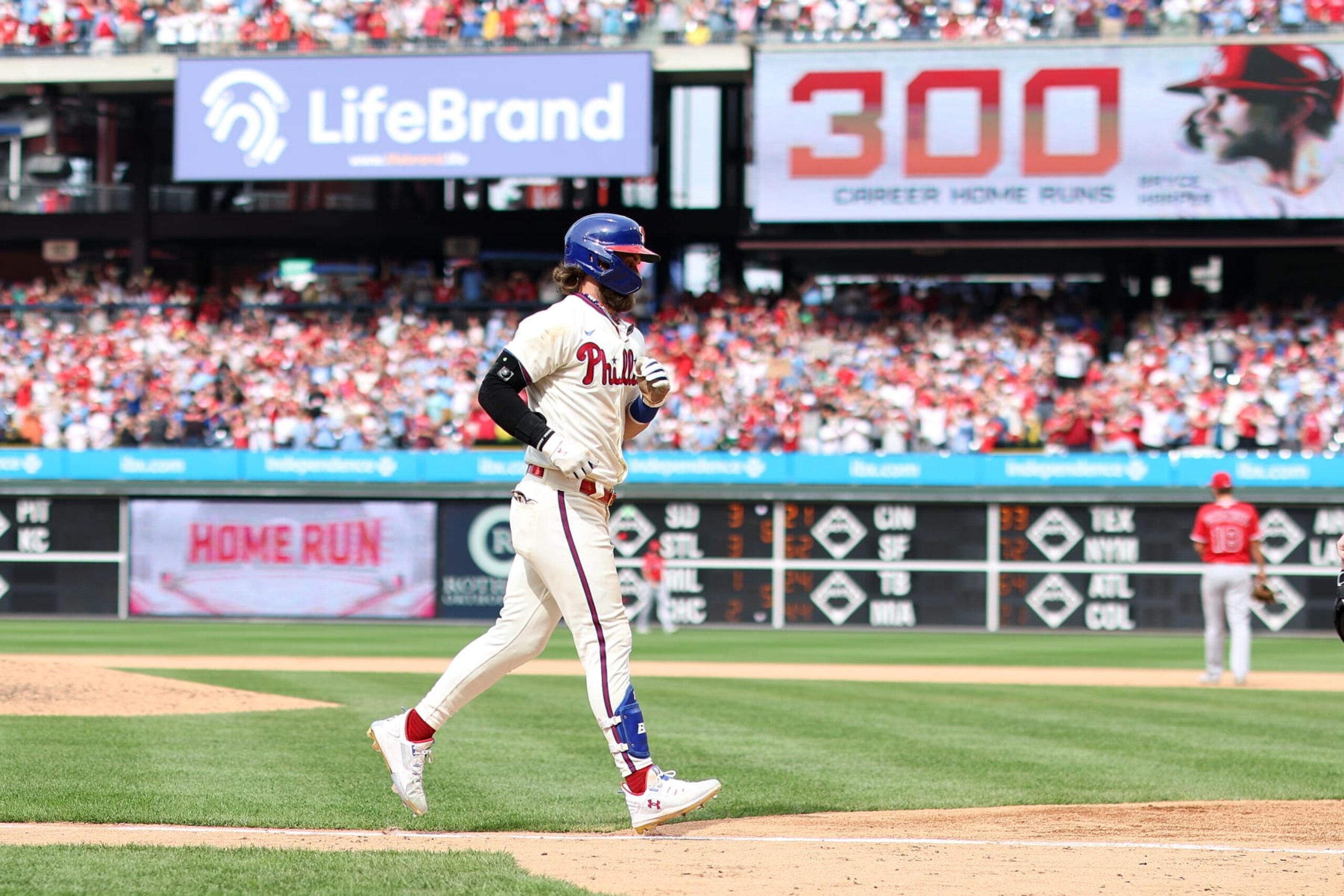 PHILADELPHIA, PENNSYLVANIA - AUGUST 30: Bryce Harper #3 of the Philadelphia Phillies round bases after hitting a two run home run during the eighth inning against the Los Angeles Angels at Citizens Bank Park on August 30, 2023 in Philadelphia, Pennsylvania. Harper hit his 300th-career MLB home run. (Photo by Tim Nwachukwu/Getty Images)