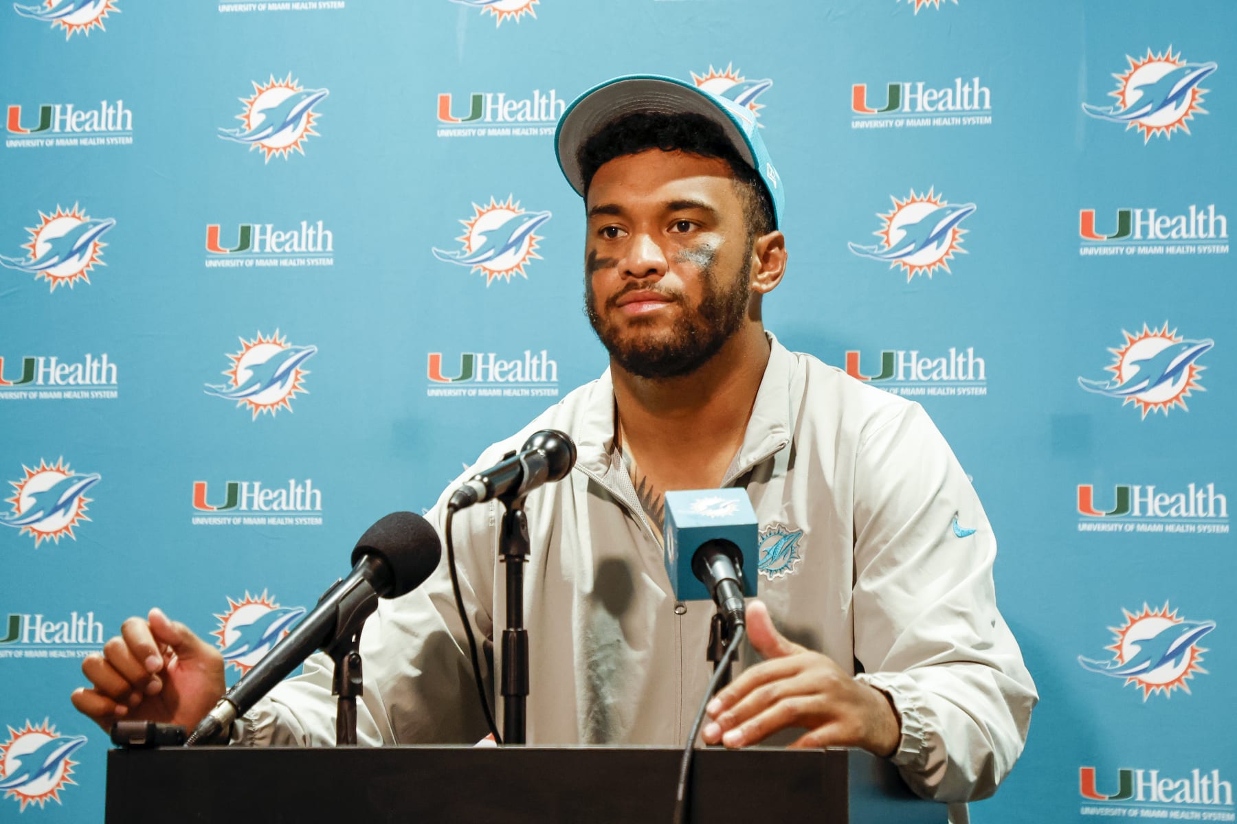 JACKSONVILLE, FL - AUGUST 26: Quarterback Tua Tagovailoa #1 of the Miami Dolphins answers questions from the media after the preseason game against the Jacksonville Jaguars at TIAA Bank Field on January 26, 2023 in Jacksonville, Florida. The Jaguars defeated the Dolphins 31 to 18. (Photo by Don Juan Moore/Getty Images)