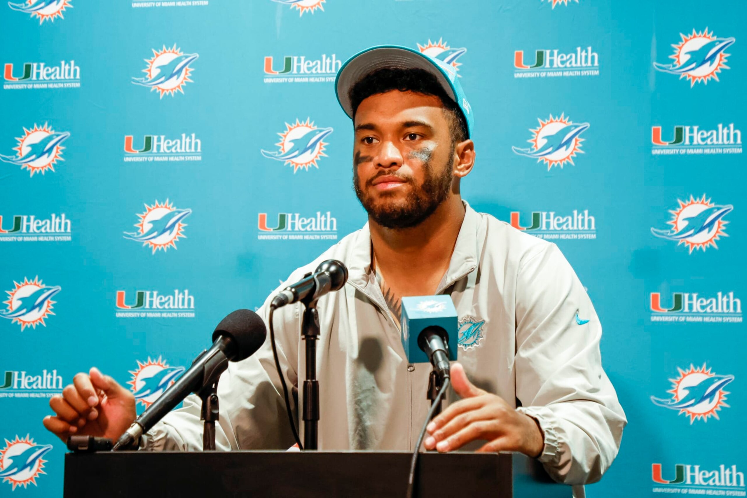 JACKSONVILLE, FL - AUGUST 26: Quarterback Tua Tagovailoa #1 of the Miami Dolphins answers questions from the media after the preseason game against the Jacksonville Jaguars at TIAA Bank Field on January 26, 2023 in Jacksonville, Florida. The Jaguars defeated the Dolphins 31 to 18. (Photo by Don Juan Moore/Getty Images)