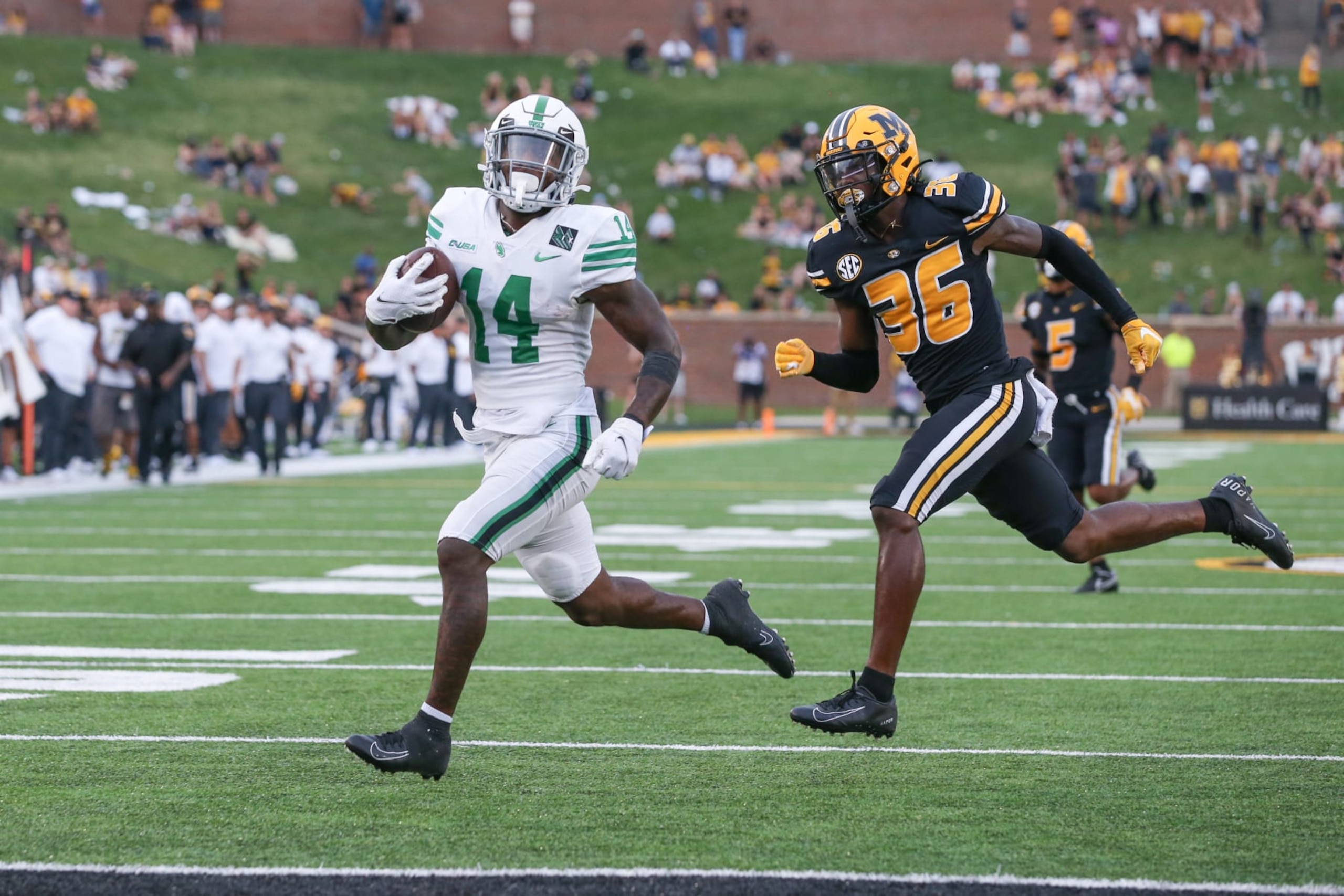 COLUMBIA, MO - OCTOBER 09: Missouri Tigers defensive back DJ Jackson (36) cant catch North Texas Mean Green wide receiver Roderic Burns (14) at the end of a 52-yard touchdown reception in the fourth quarter of a college football game between the North Texas Mean Green and Missouri Tigers on Oct 9, 2021 at Memorial Stadium in Columbia, MO. (Photo by Scott Winters/Icon Sportswire via Getty Images)
