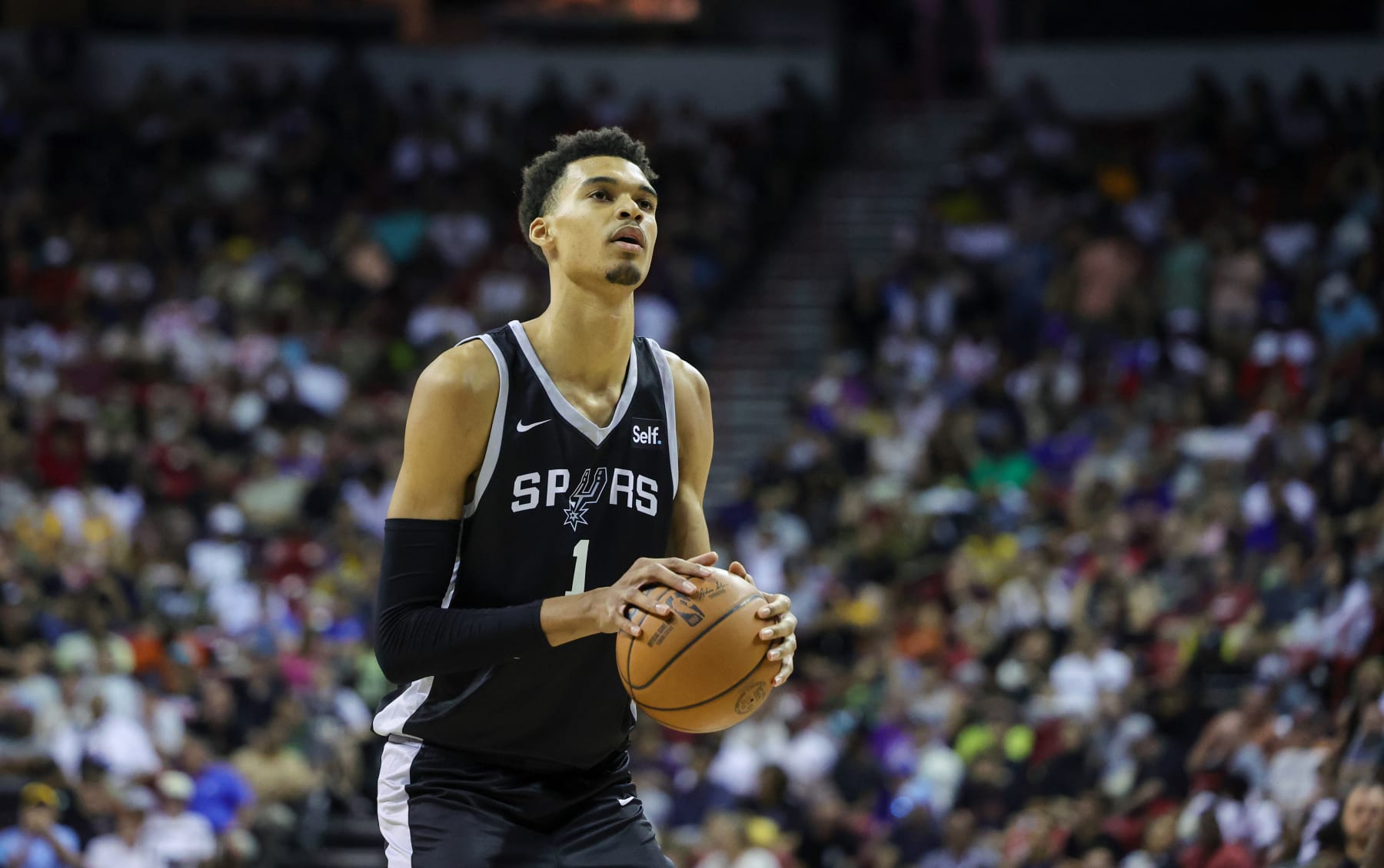 LAS VEGAS, NEVADA - JULY 09: Victor Wembanyama #1 of the San Antonio Spurs shoots a free throw against the Portland Trail Blazers in the second half of a 2023 NBA Summer League game at the Thomas & Mack Center on July 09, 2023 in Las Vegas, Nevada. NOTE TO USER: User expressly acknowledges and agrees that, by downloading and or using this photograph, User is consenting to the terms and conditions of the Getty Images License Agreement. (Photo by Ethan Miller/Getty Images)