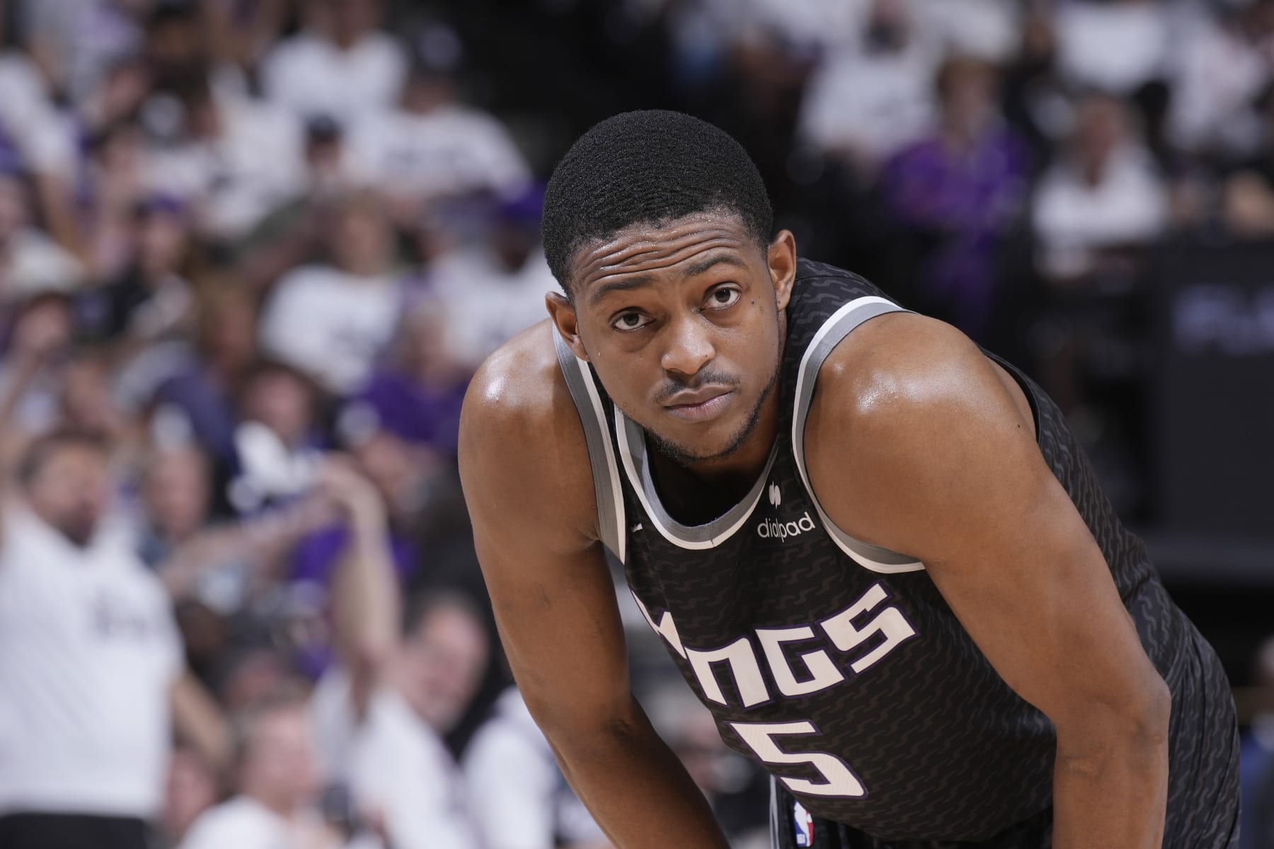 SACRAMENTO, CA - APRIL 30: De'Aaron Fox #5 of the Sacramento Kings looks on during the game against the Golden State Warriors during Round 1 Game 7 of the 2023 NBA Playoffs on April 30, 2023 at Golden 1 Center in Sacramento, California. NOTE TO USER: User expressly acknowledges and agrees that, by downloading and or using this photograph, User is consenting to the terms and conditions of the Getty Images Agreement. Mandatory Copyright Notice: Copyright 2023 NBAE (Photo by Rocky Widner/NBAE via Getty Images)